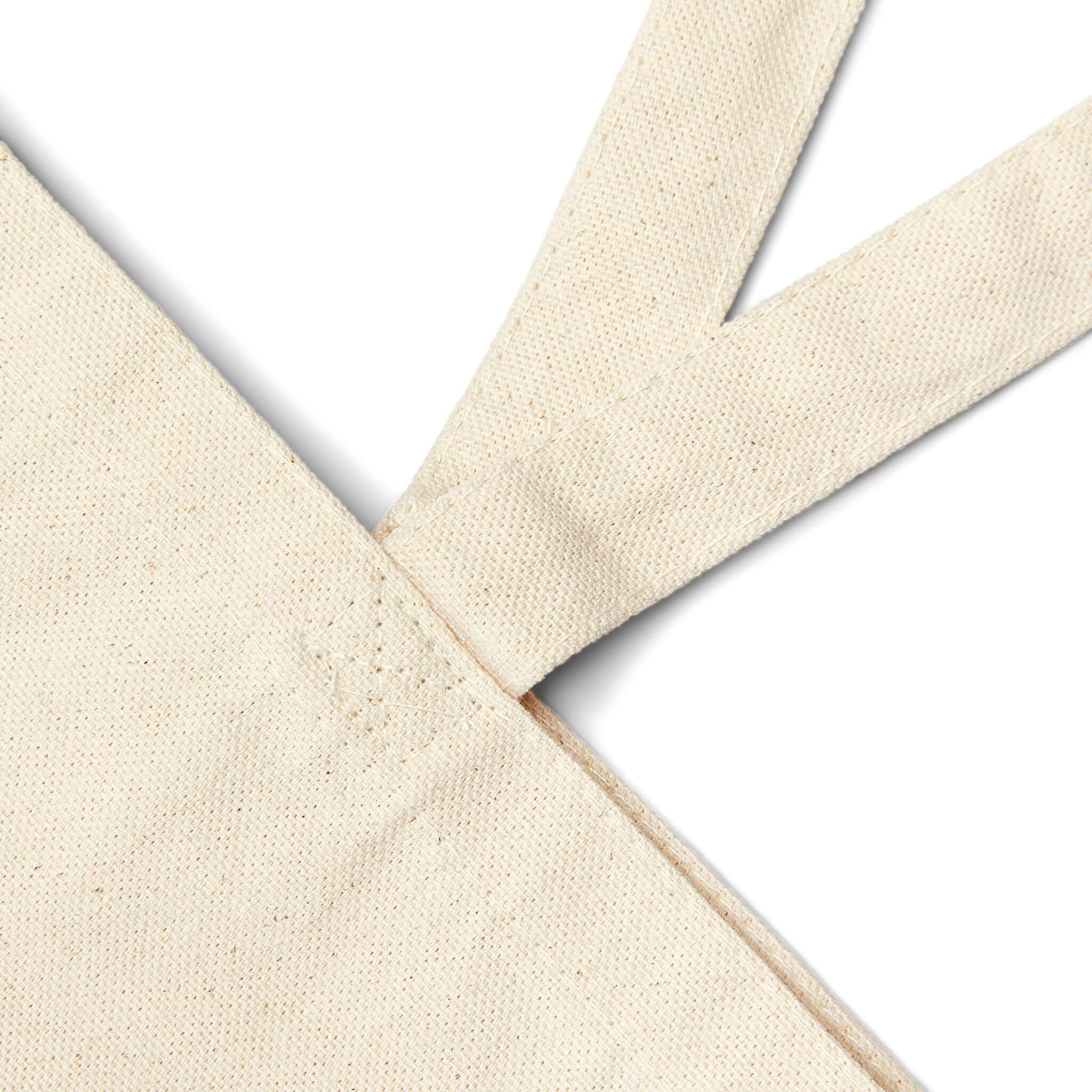 Detail of Taily Bird Bold Canvas Tote Bag handles and fabric showcasing durability and style.