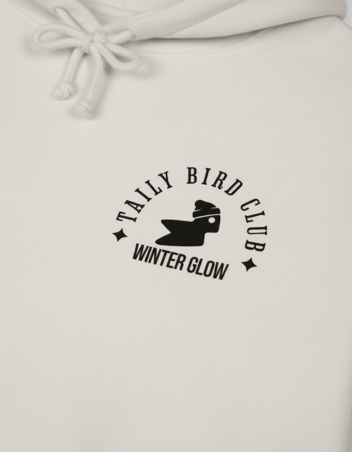 Taily Bird Club Winter Glow Hoodie – Bone with small Winter Glow emblem on the front.