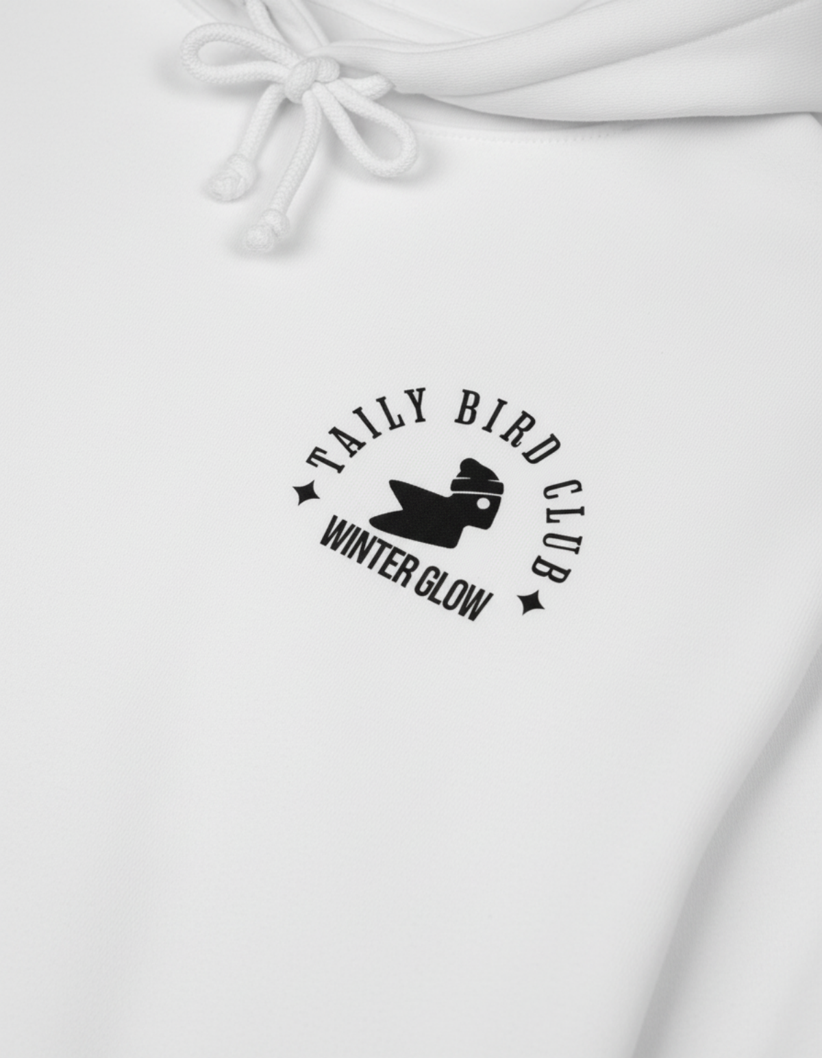 Taily Bird Club Winter Glow Hoodie in white featuring front emblem and cozy streetwear style.