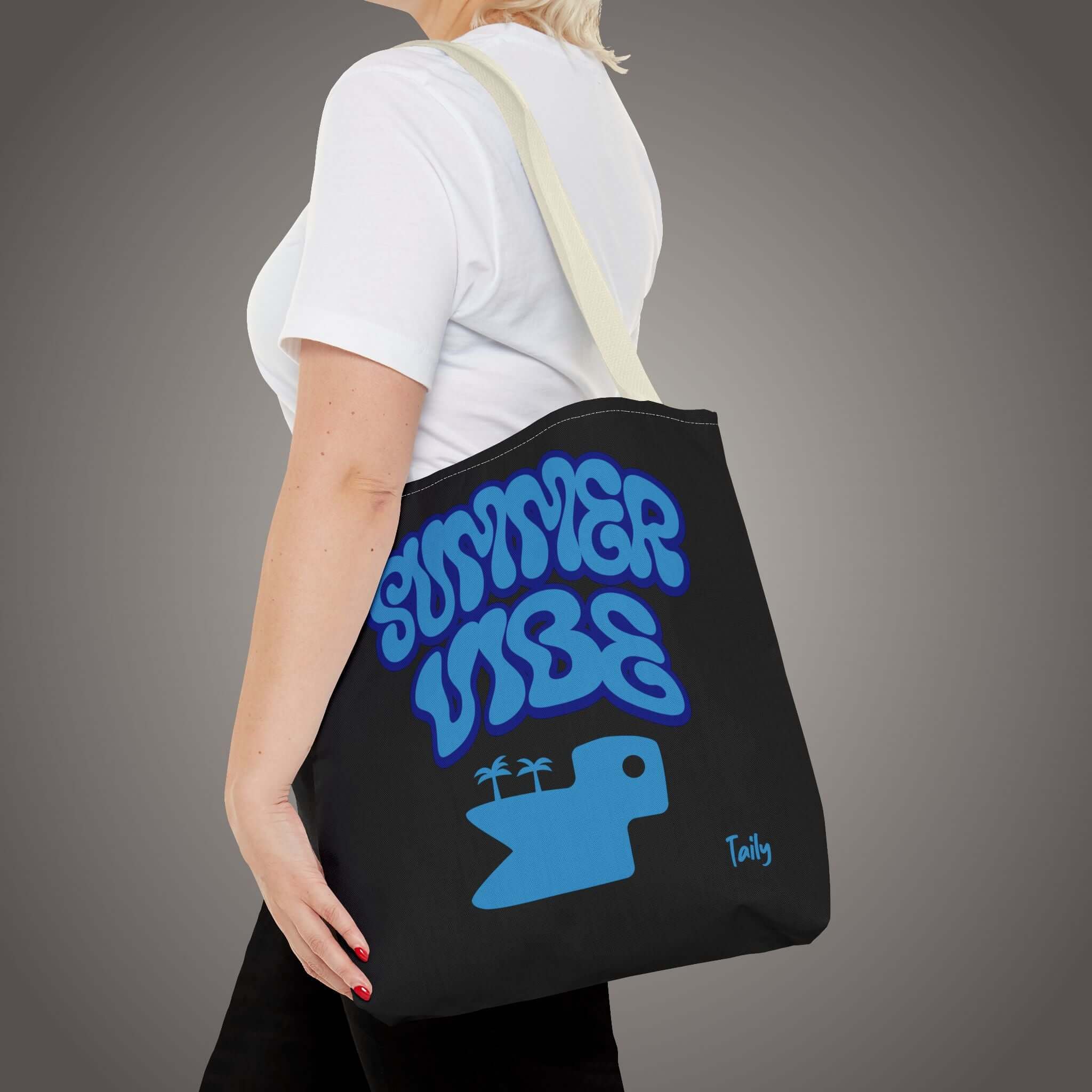 Summer Vibe Tote Bag in black featuring bold blue lettering, perfect for stylish everyday use.