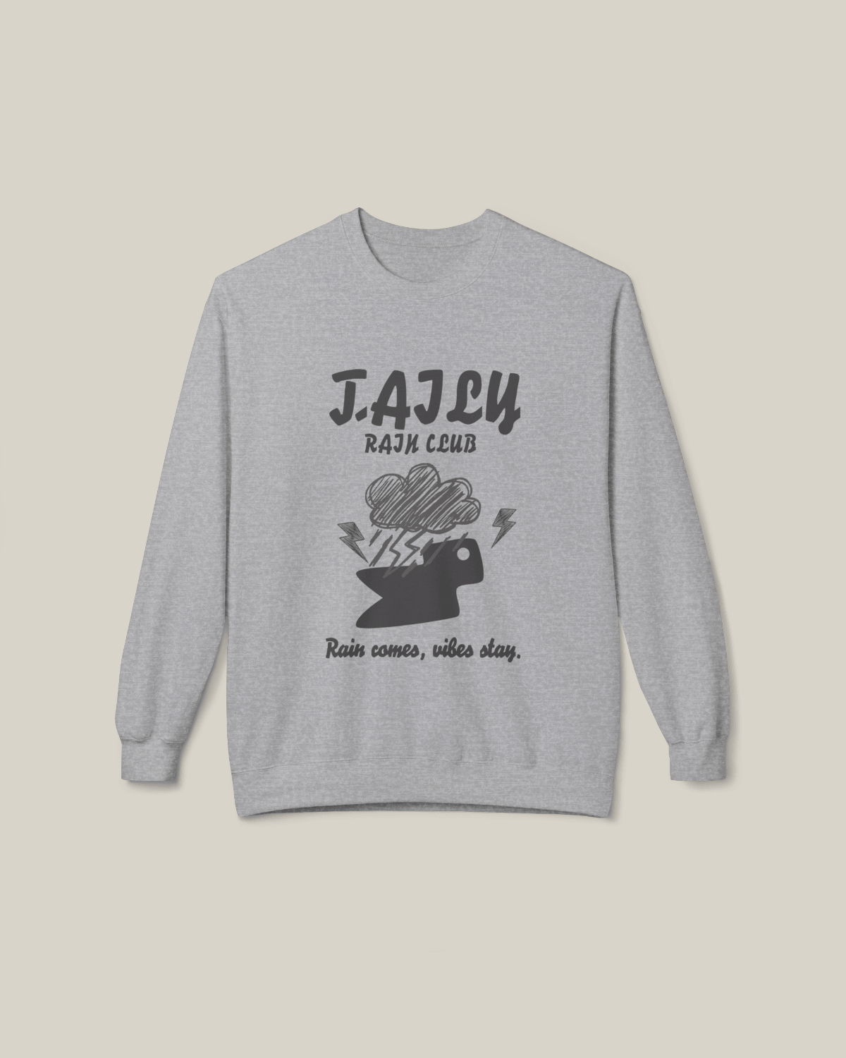 Taily Rain Club sweatshirt in Sport Grey featuring cloud and lightning design with "Rain comes, vibes stay" phrase.