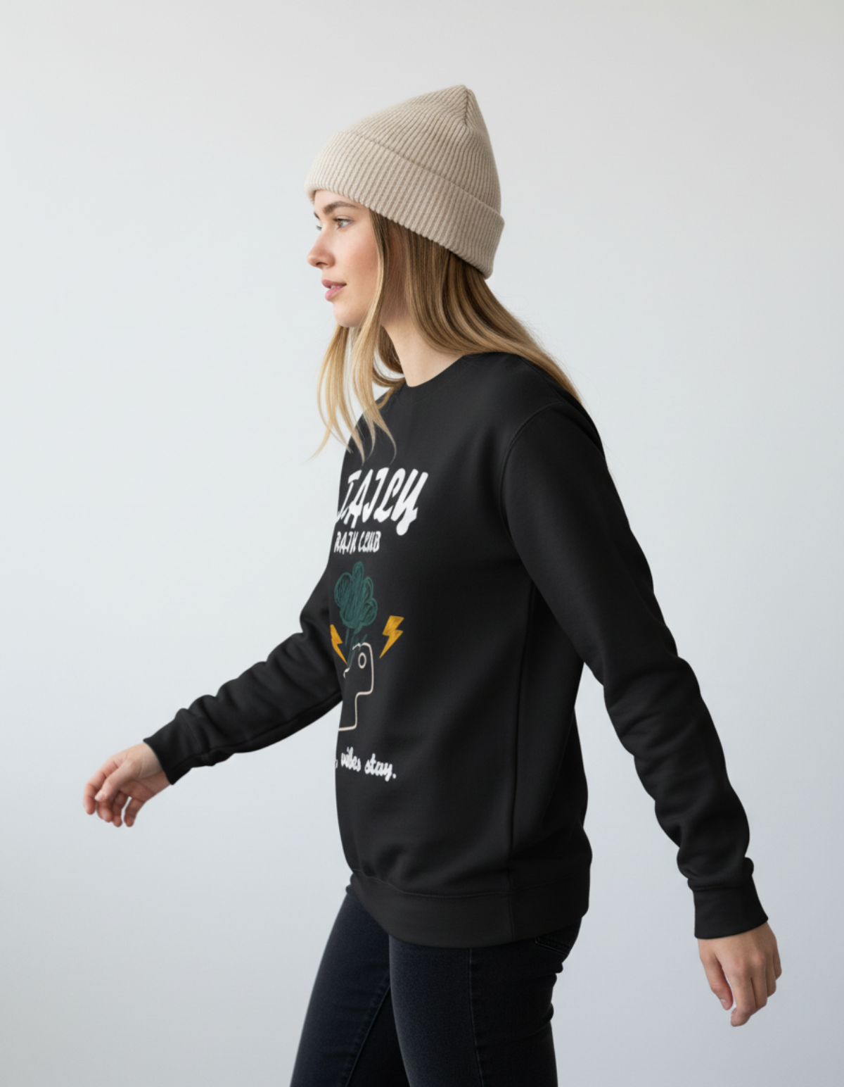 Woman wearing Taily Rain Club sweatshirt in Black with weather-inspired graphic and beanie.