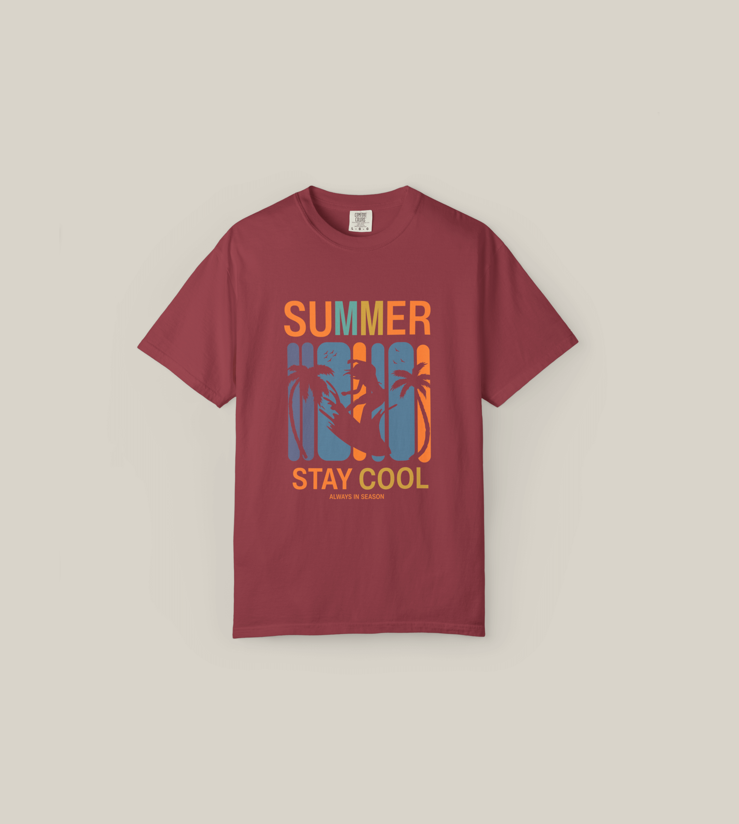 Bold maroon Summer Stay Cool T-Shirt featuring graphic surfer design and retro color blocks, perfect for summer vibes.