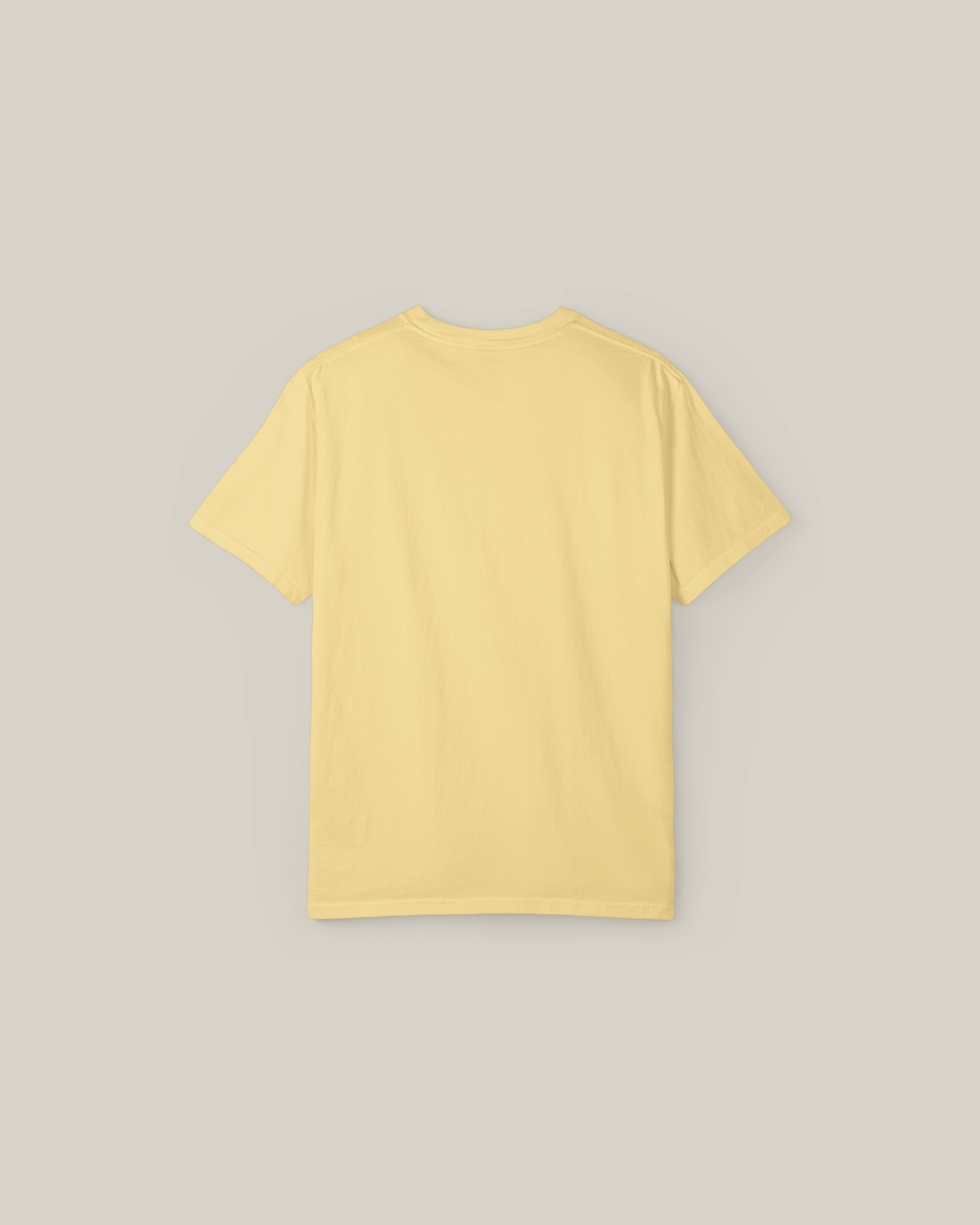Back view of Taily Street Rebel graphic tee in butter color, showcasing a comfortable and stylish streetwear design.