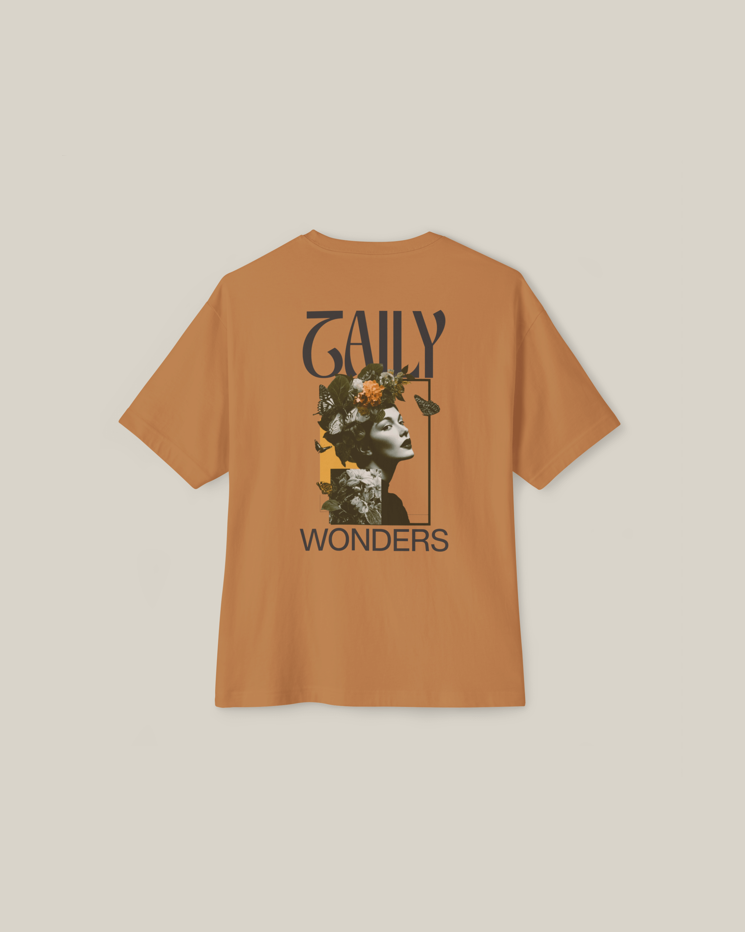 Taily Wonders Vintage Boxy Tee in toast with floral design and bold portrait on the back.