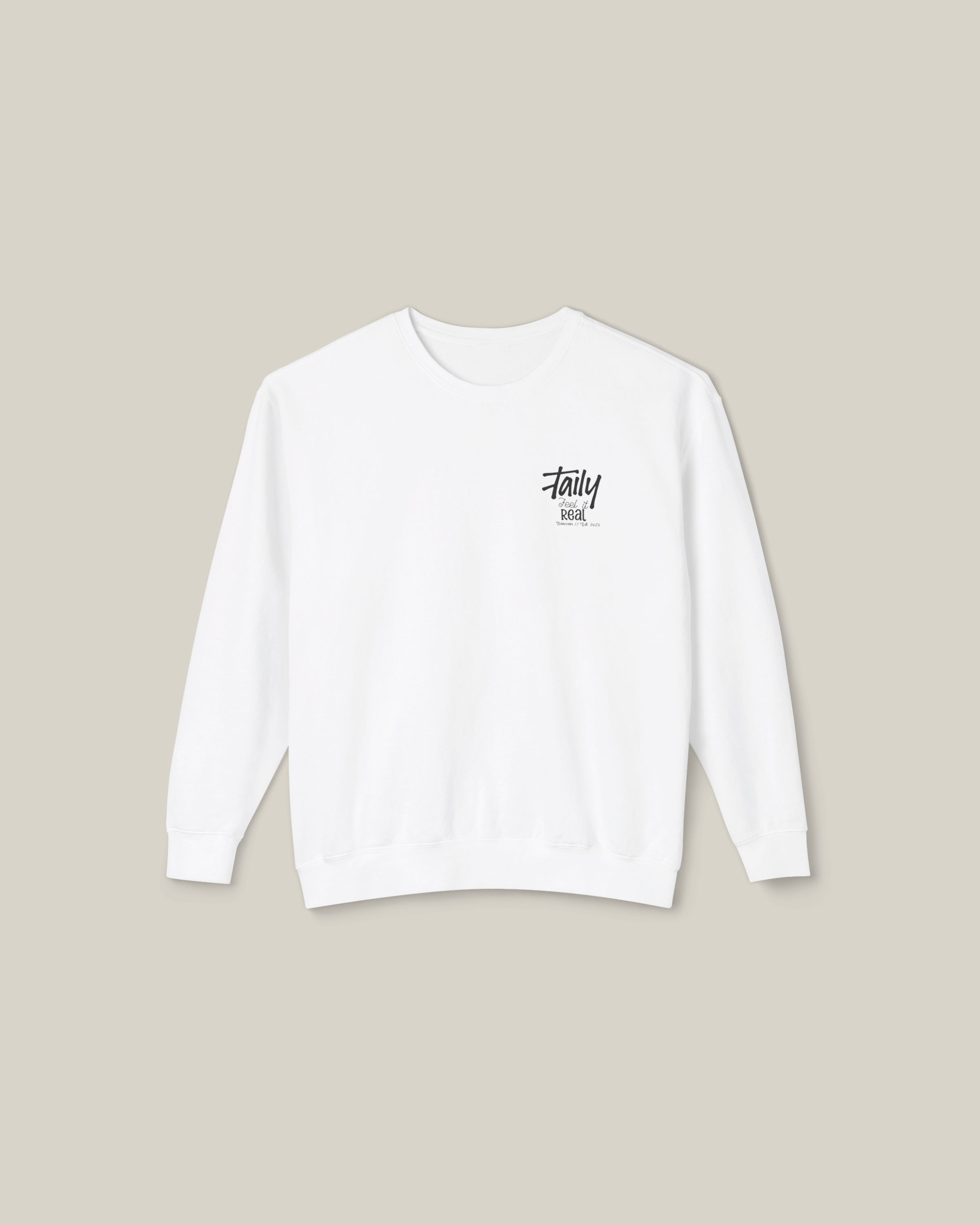 White Taily Feel It Real sweatshirt featuring chest logo and bold lettering, perfect for street style comfort.