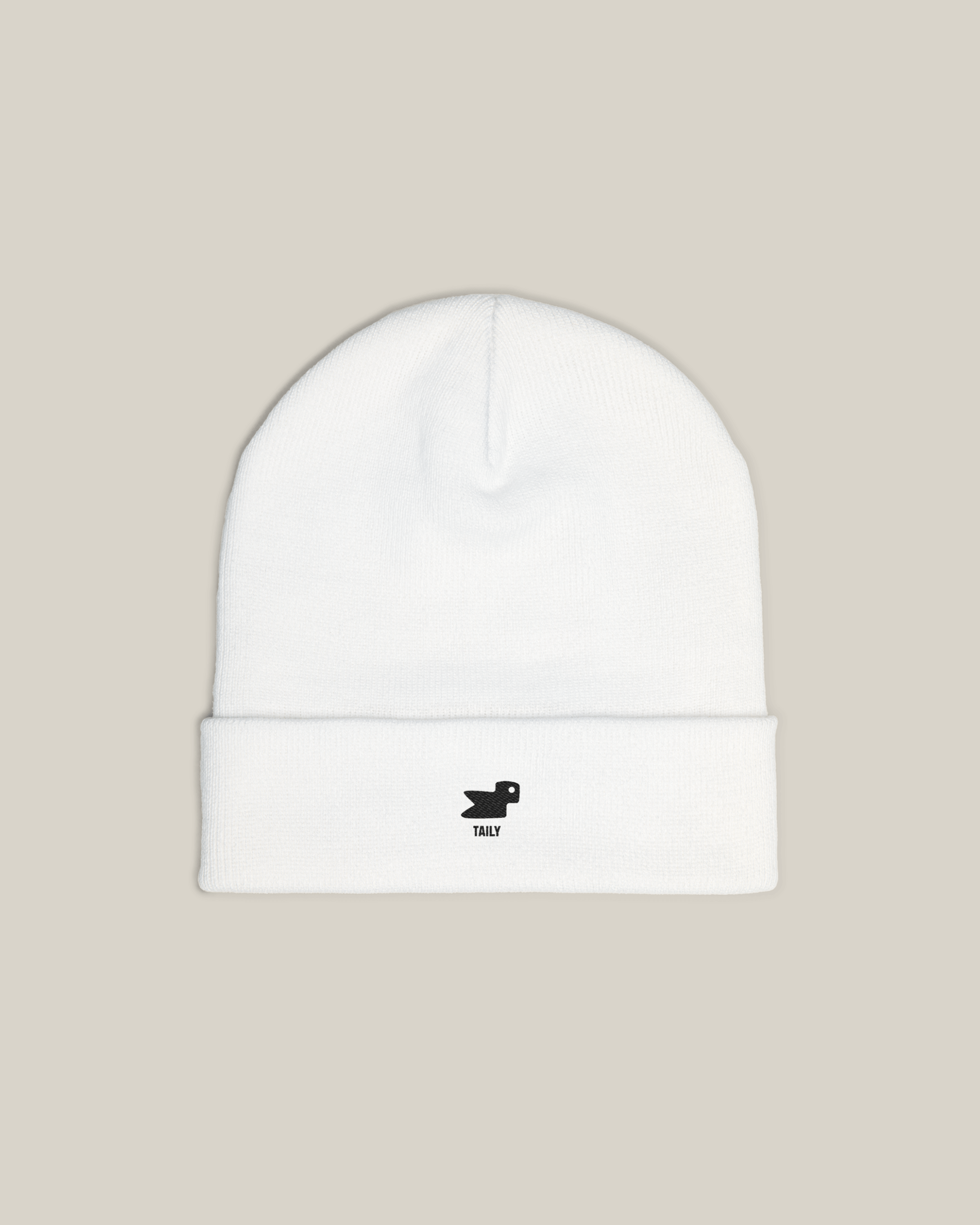 Taily Bird Knit Beanie in white with minimal embroidery and soft cotton-acrylic blend for comfort and style.