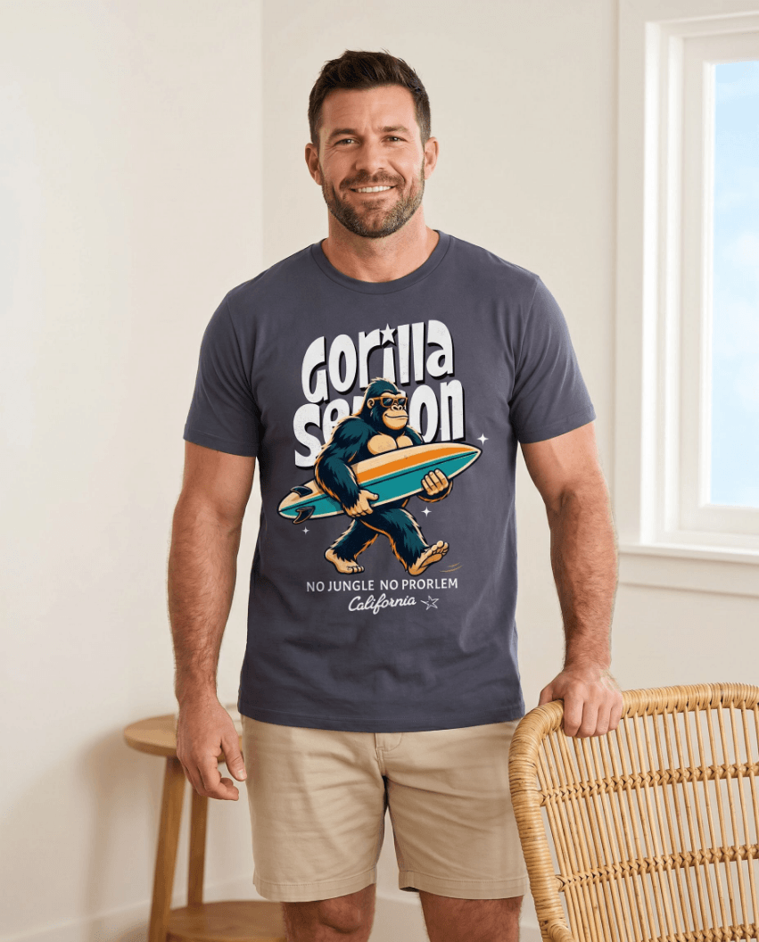 Gorilla Season Surf Tee – Navy worn by a man with a surfboard graphic, no jungle, California vibe.