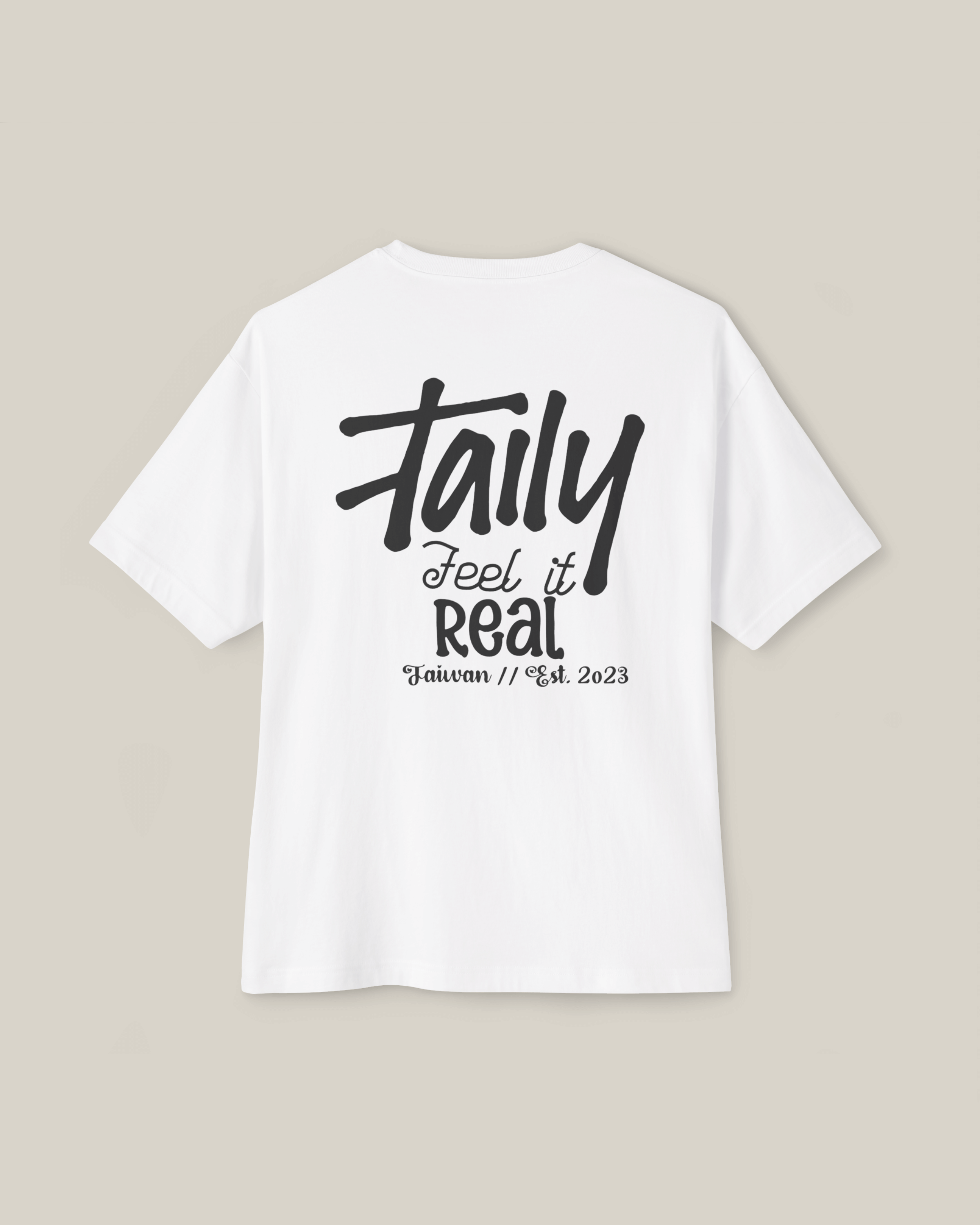 Taily Feel It Real Boxy Tee – White, streetwear boxy t-shirt with bold lettering on back, comfortable and stylish.