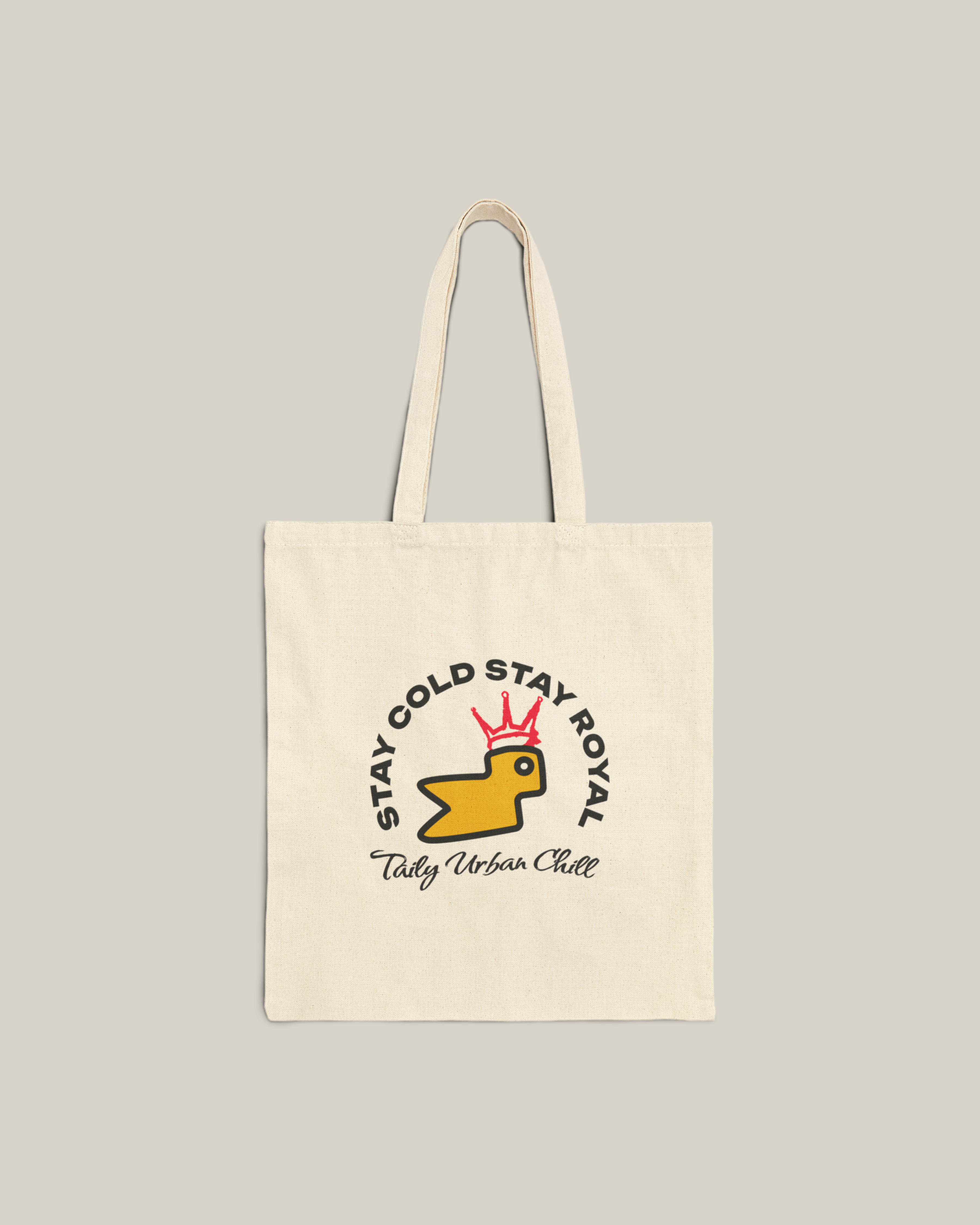 Taily Bird Bold Canvas Tote Bag featuring a logo with a yellow bird, perfect for stylish everyday use.