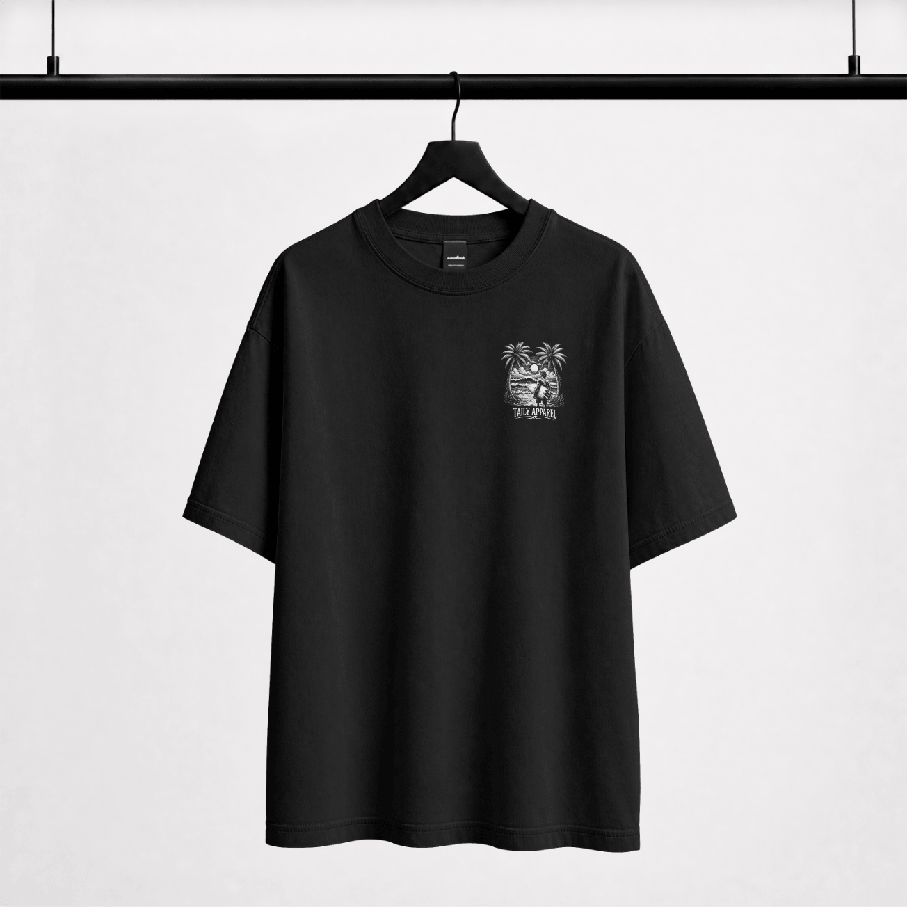 Soul Surfer Malibu Tee hanging from a black hanger, featuring a palm tree logo on the chest.