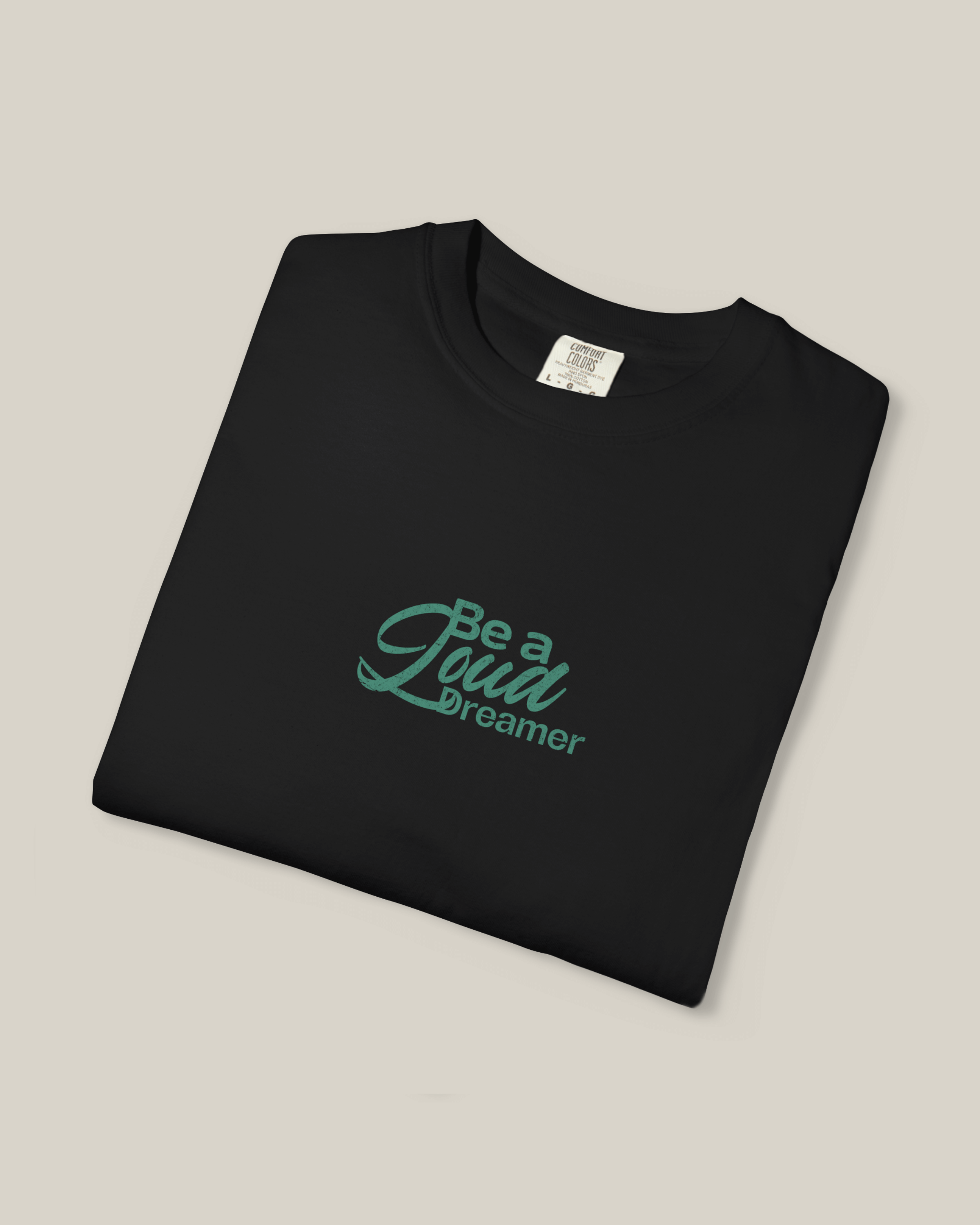 Taily Loud Dreamer Streetwear Graphic T-Shirt in black with bold script lettering on a clean front design.