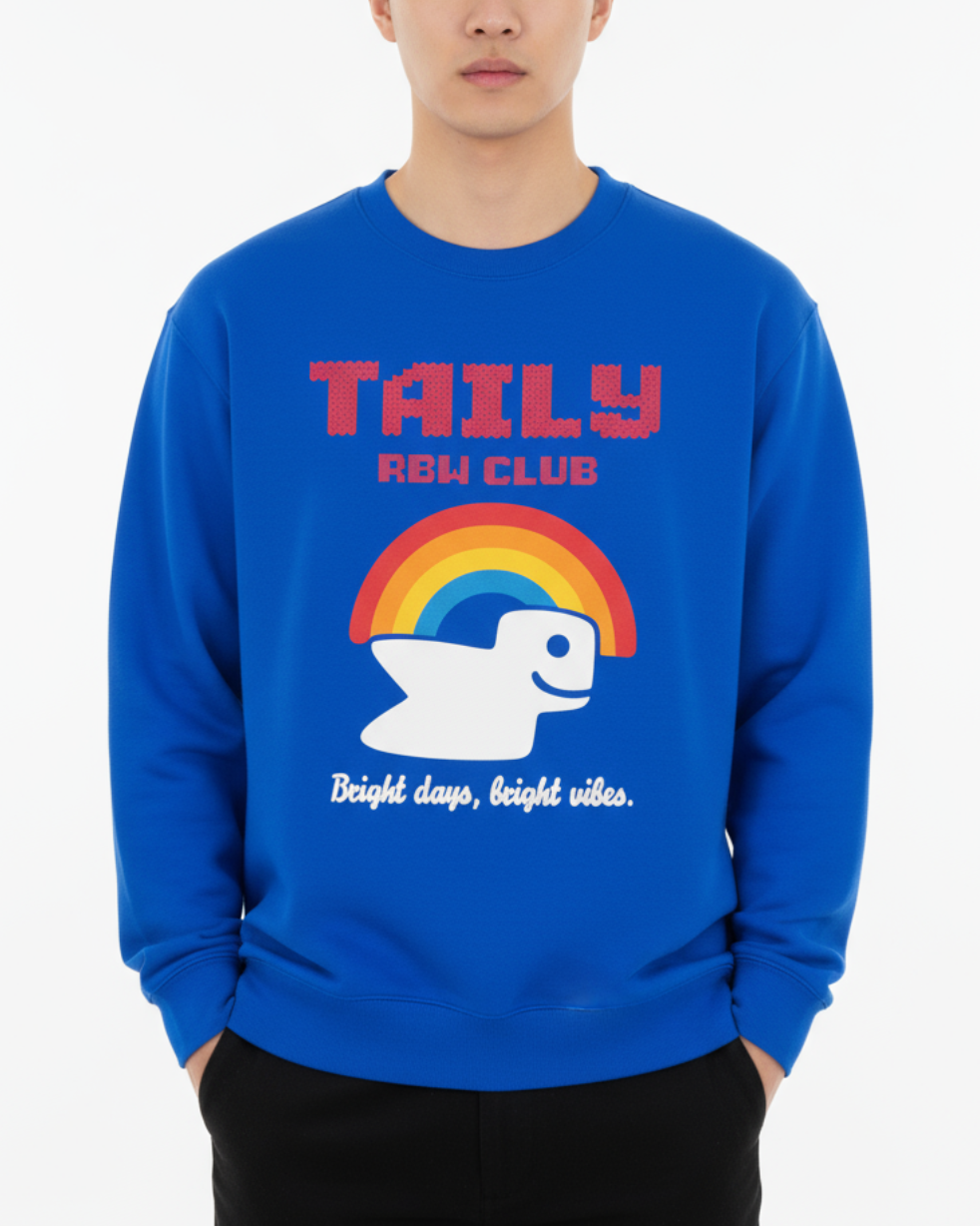 Taily RBW Club sweatshirt in royal blue featuring rainbow graphic and cheerful bird design.