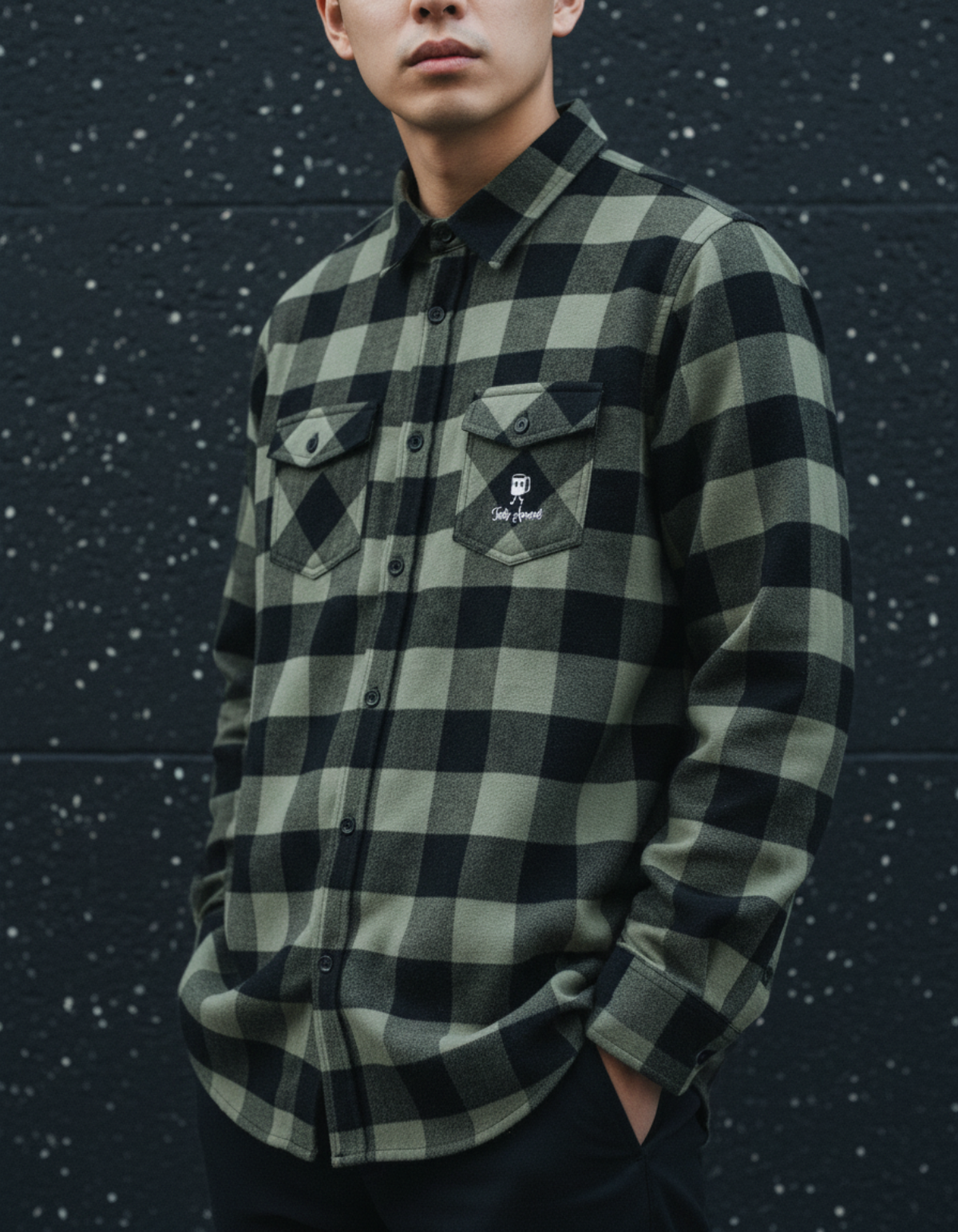 Model wearing Taily Coffee flannel shirt in Olive, showcasing classic buffalo plaid style and embroidered pocket.
