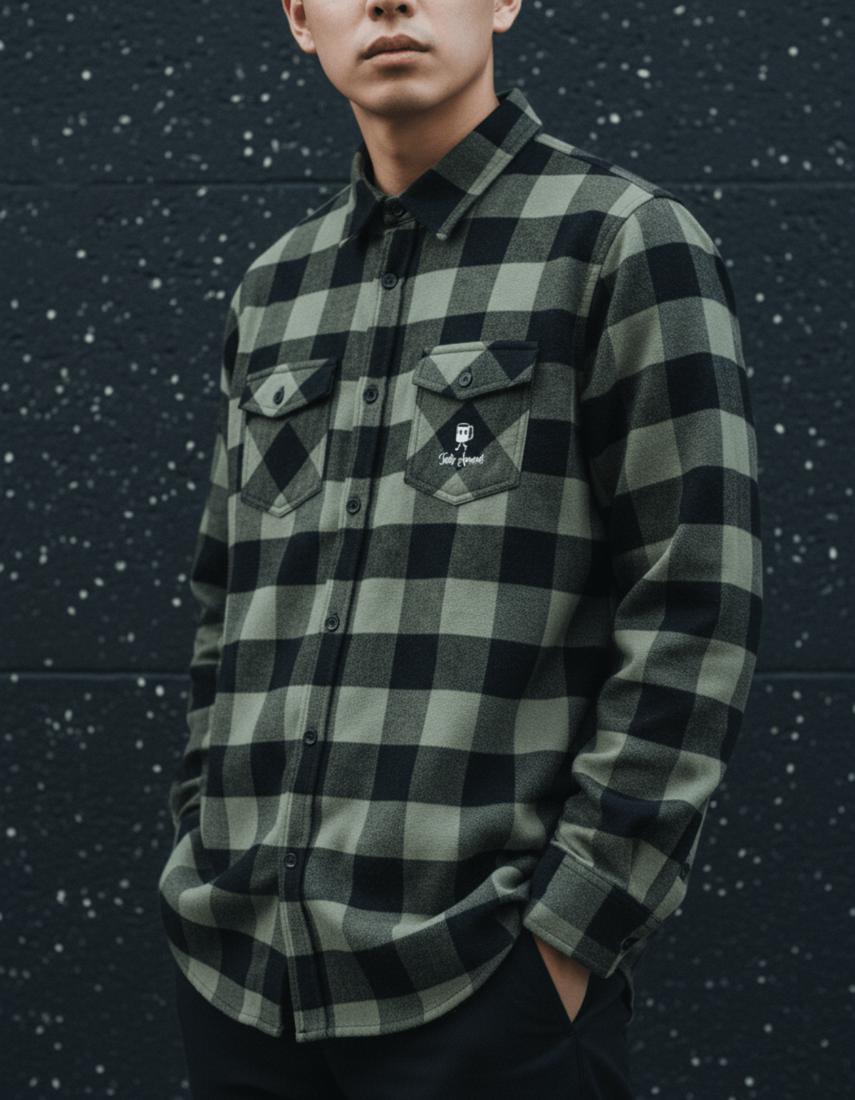 Model wearing Taily Coffee flannel shirt in Olive, showcasing classic buffalo plaid style and embroidered pocket.