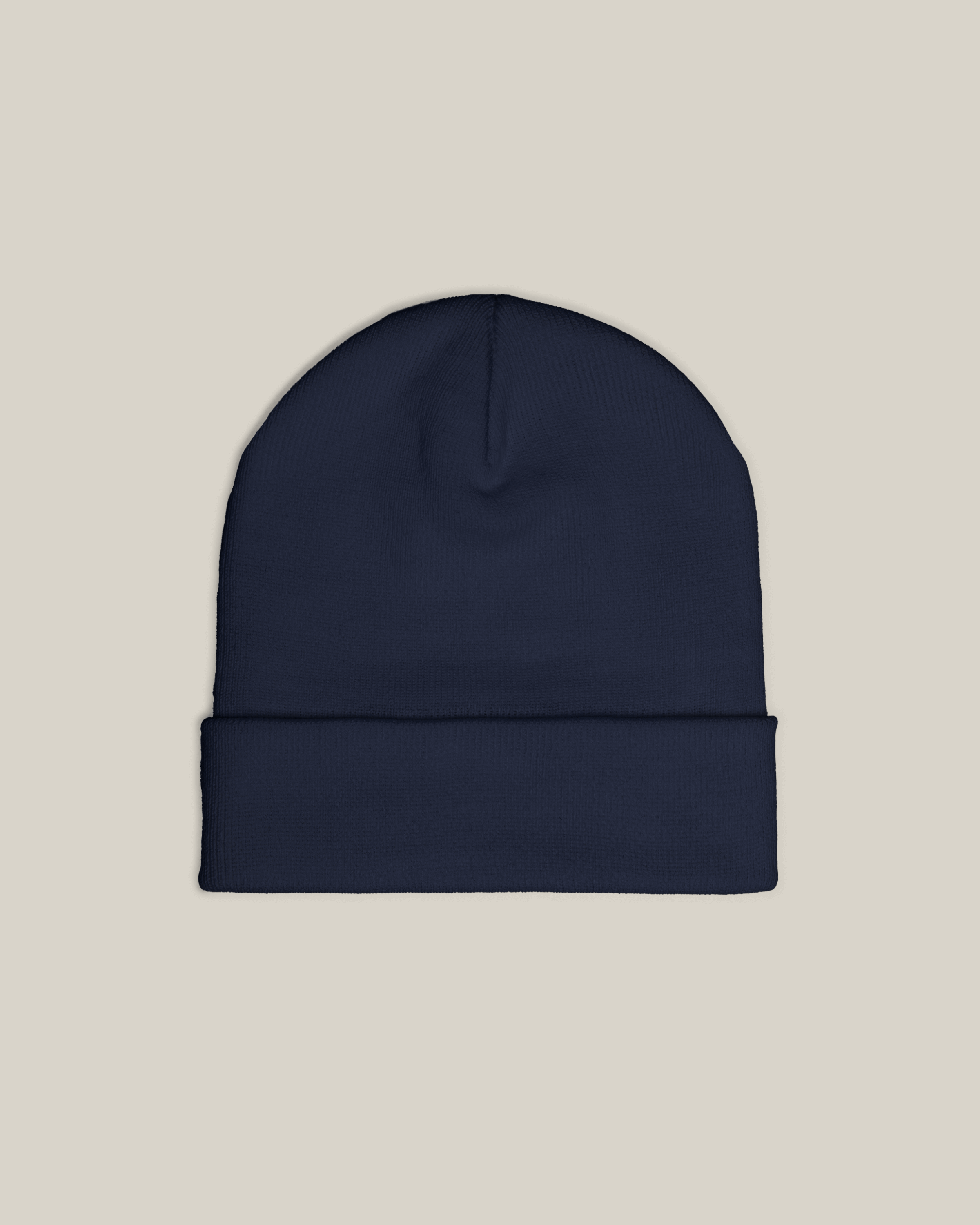 Taily Bird Knit Beanie in dark navy color with minimalist design and soft breathable fabric.