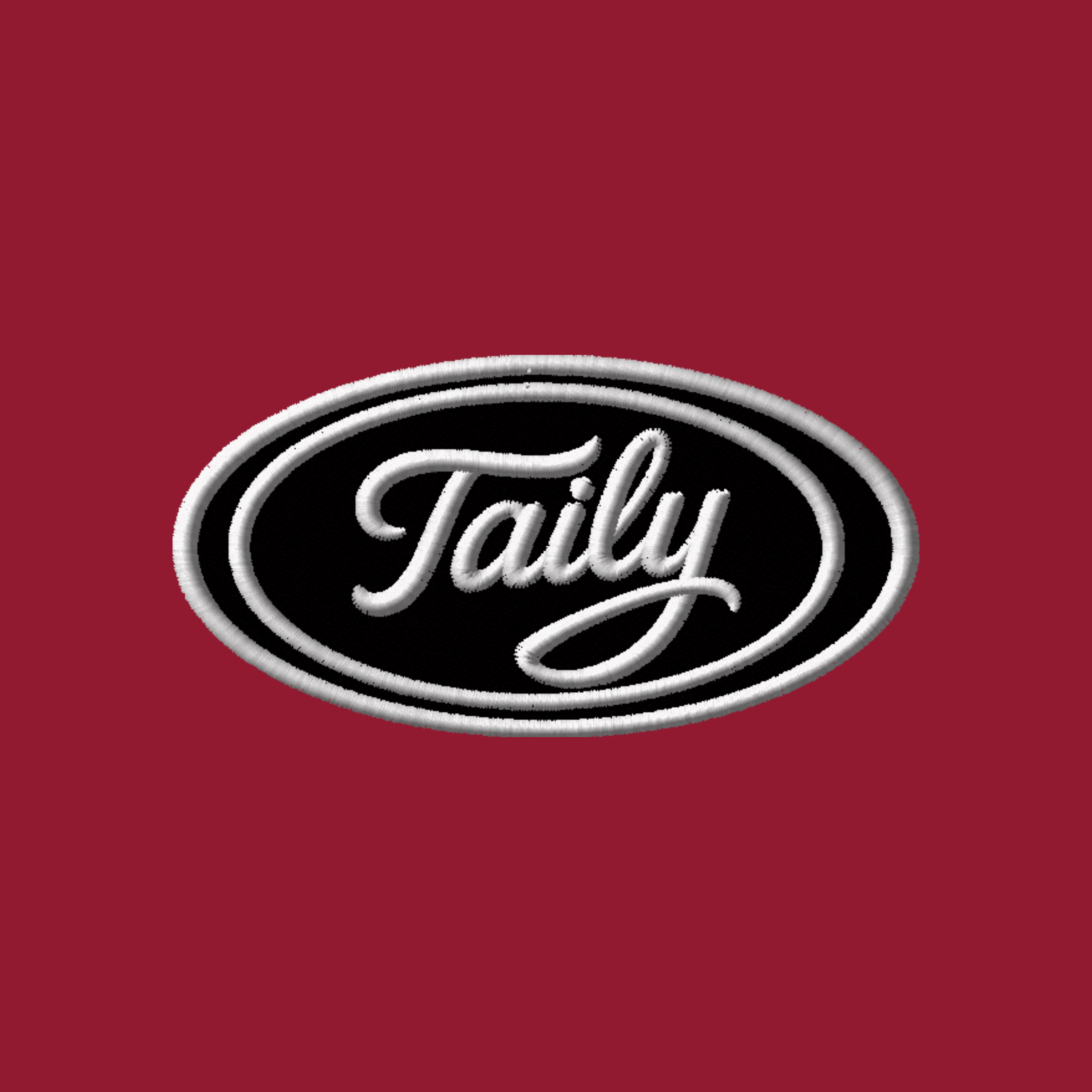 Taily Zip Hoodie embroidered logo on cardinal red background, featuring elegant cursive lettering.