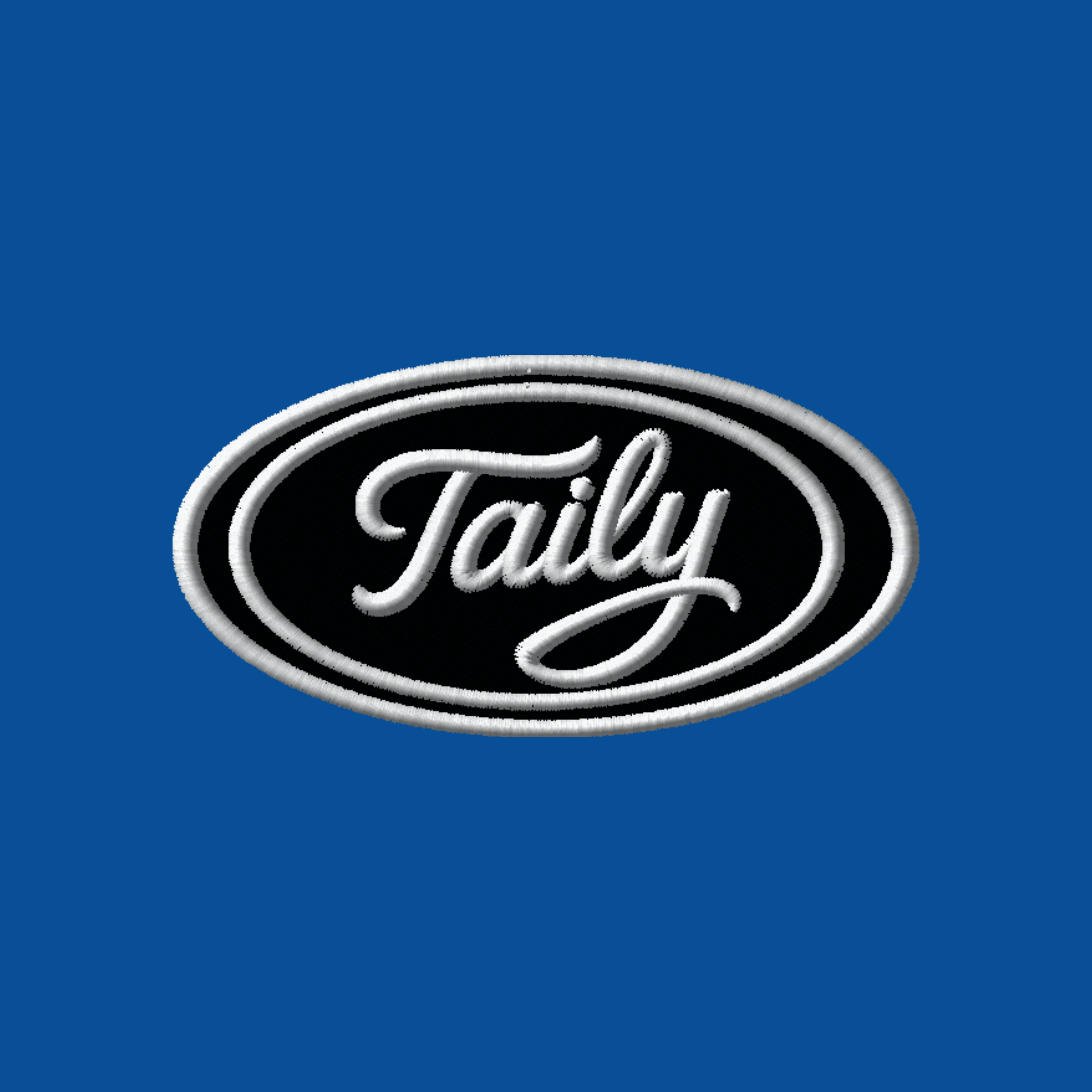 Taily logo patch in white embroidery on a black oval against a royal blue background.