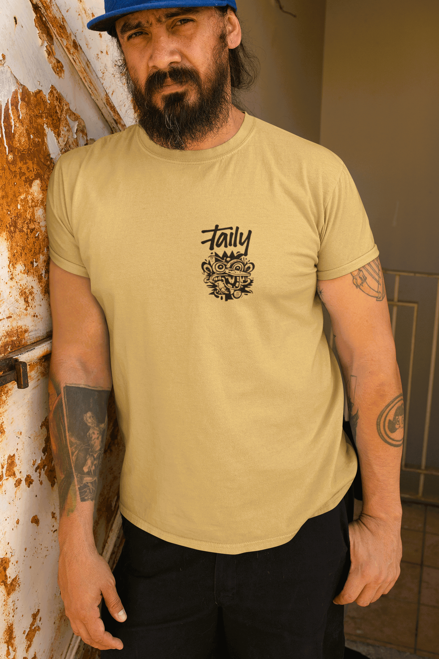 Man wearing Taily Totem Power Tee in mustard with chest logo, showcasing streetwear style and comfort.