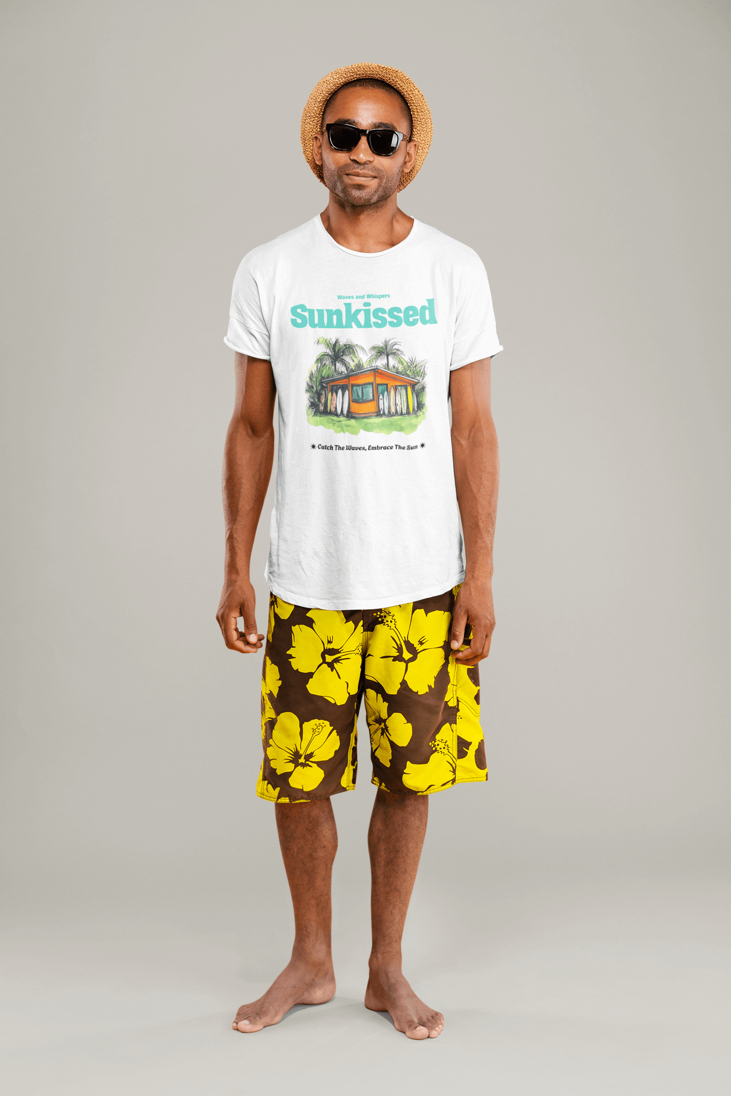 Model wearing Sunkissed Surf Shack T-shirt with vibrant floral shorts, embodying summer beach vibes.