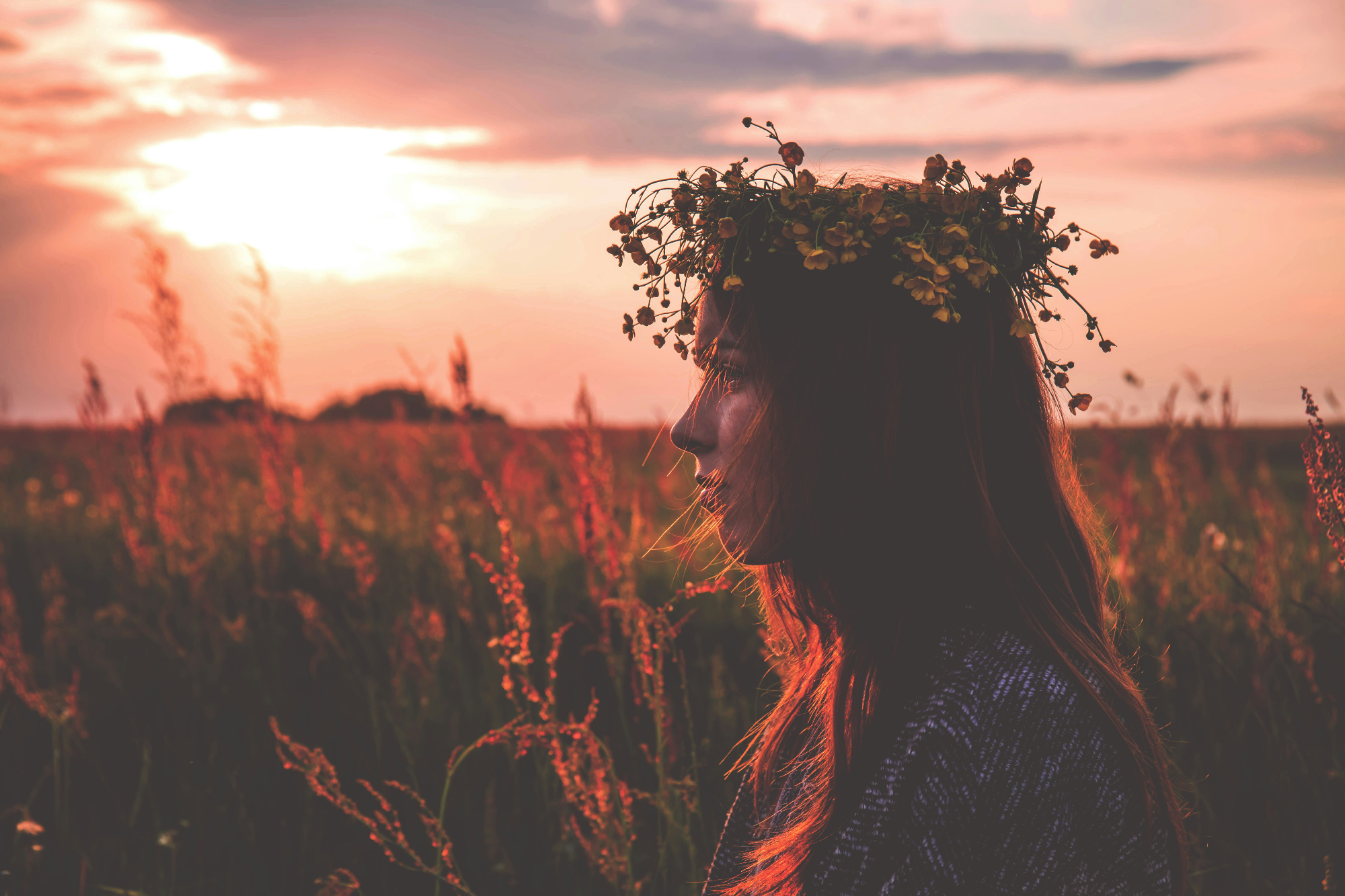 Woman with flower crown standing in a sunset field – Boho Spirit Collection