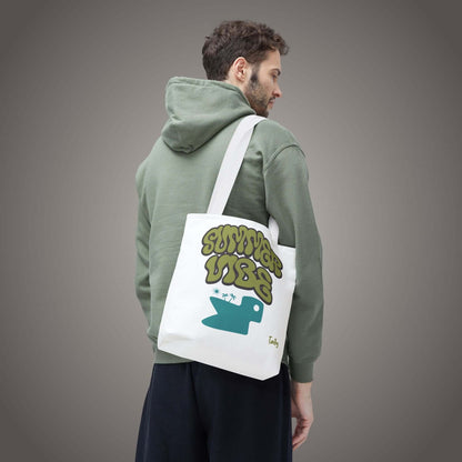 Man wearing Summer Vibe Tote Bag in white with retro lettering, perfect for style and daily use.