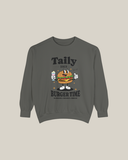 Taily Diner Burger Time sweatshirt featuring a smiling burger mascot and retro diner design.
