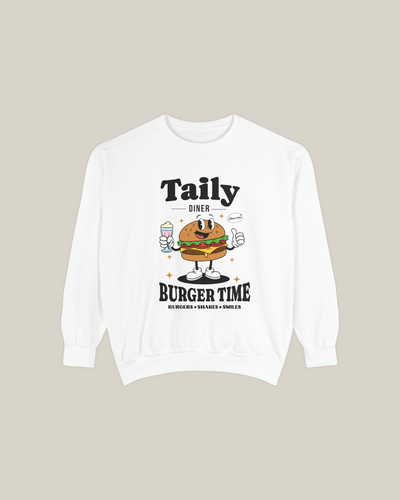 Taily Diner Burger Time sweatshirt in white featuring a smiley burger mascot and playful typography.