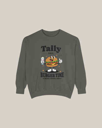 Taily Diner Burger Time sweatshirt featuring a cheerful burger mascot with a milkshake and slogan.