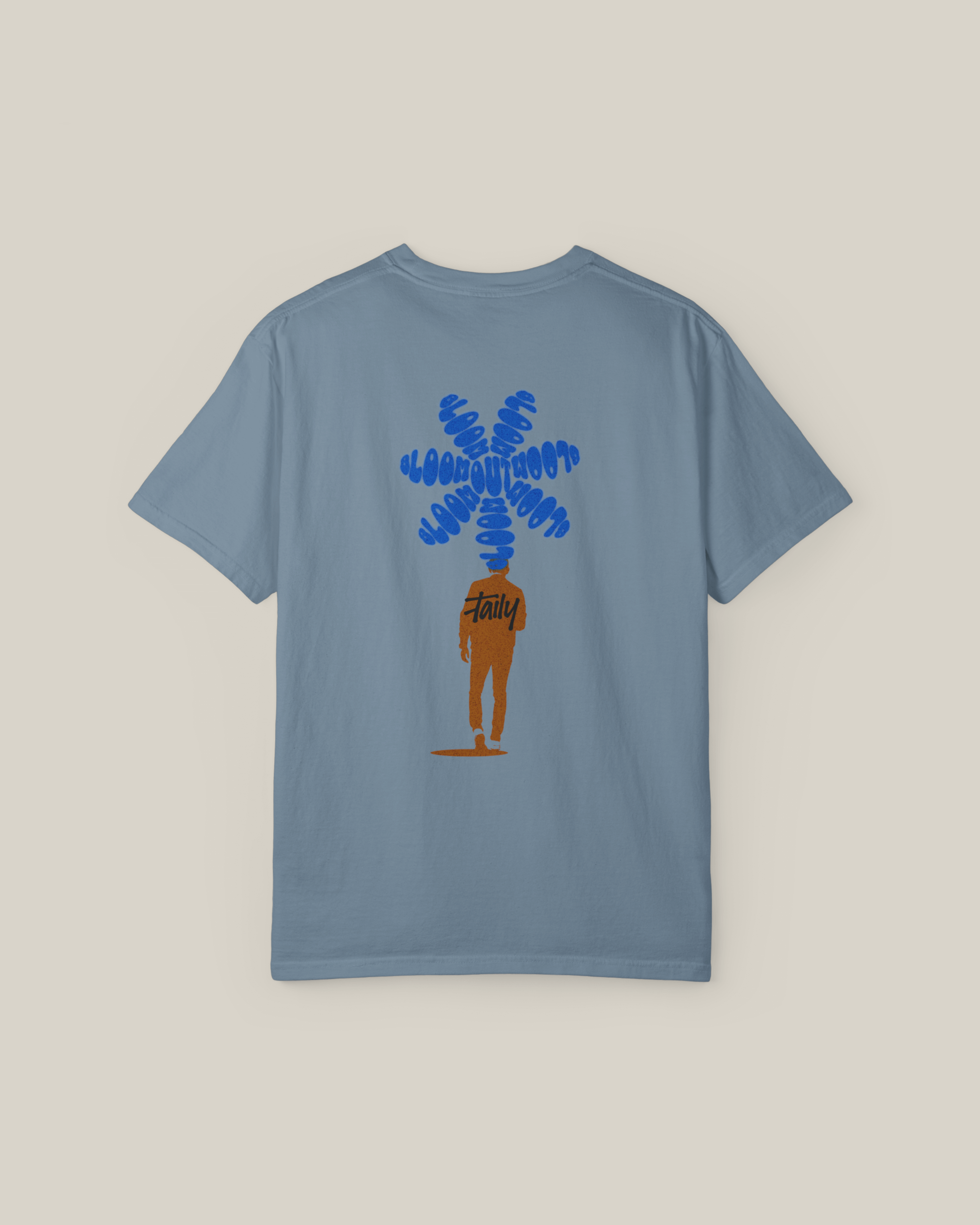 Back view of Taily Bloom Tee in ice blue, featuring streetwear graphic t-shirt with bold BLOOM artwork.