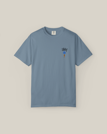 Taily Bloom Tee in ice blue, featuring a chest logo and bold design, a stylish streetwear graphic t-shirt.