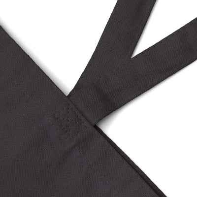 Close-up of Taily Bird Bold Canvas Tote Bag showing black fabric and strap details.