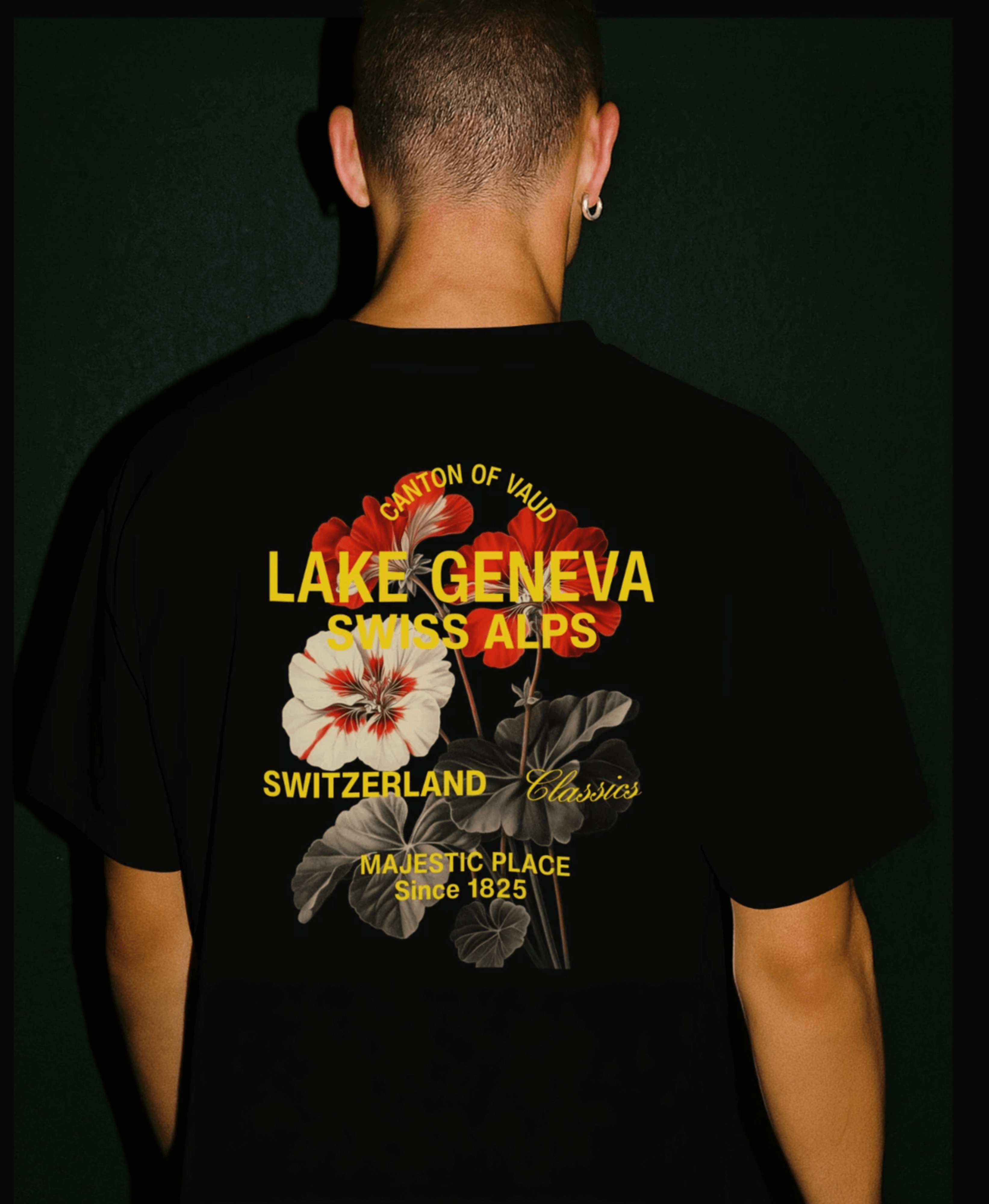 Lake Geneva Floral Oversized Tee featuring a graphic back print with Swiss Alps and floral design.
