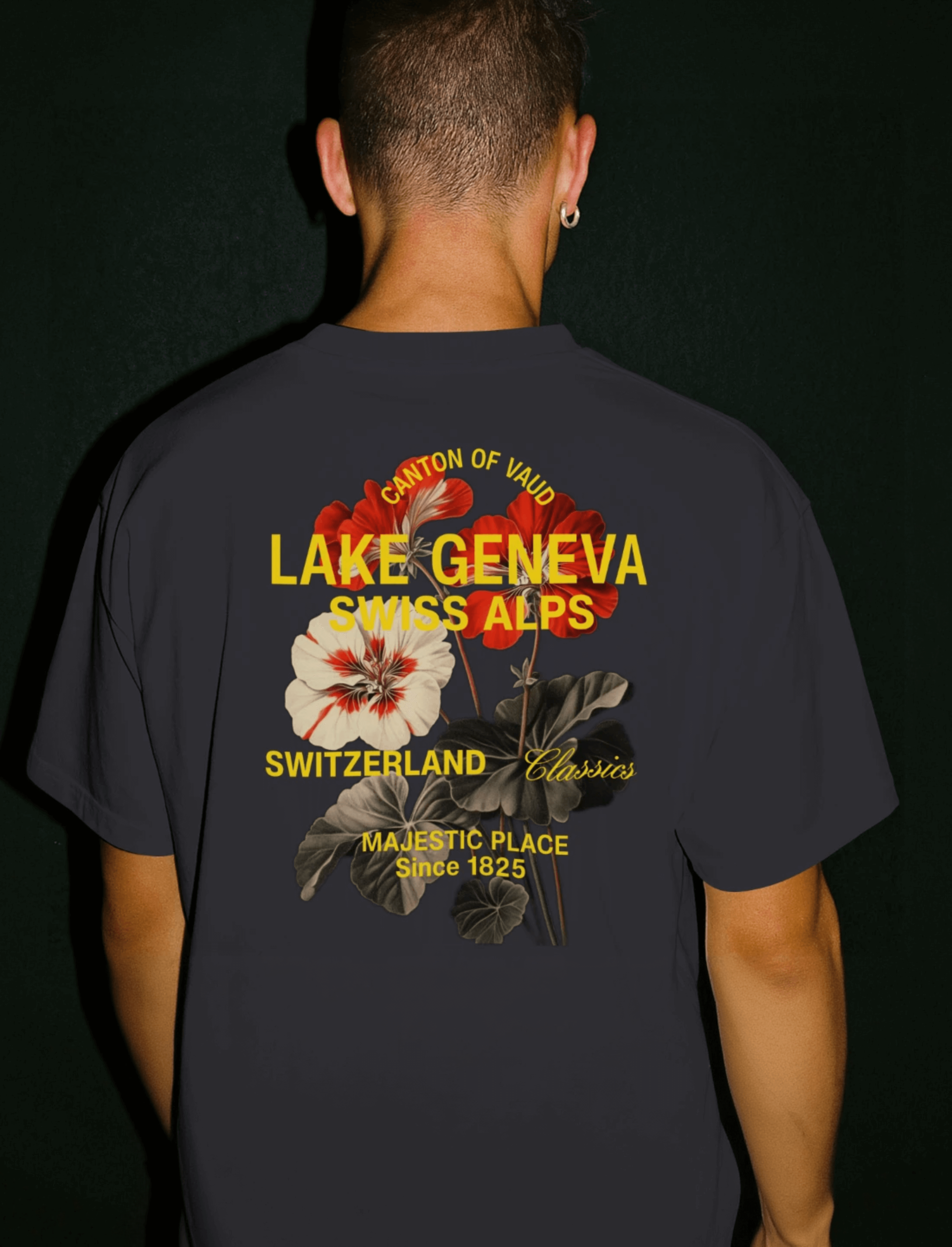 Lake Geneva Floral Oversized Tee featuring a graphic back print with Swiss Alps design and minimal front logo.