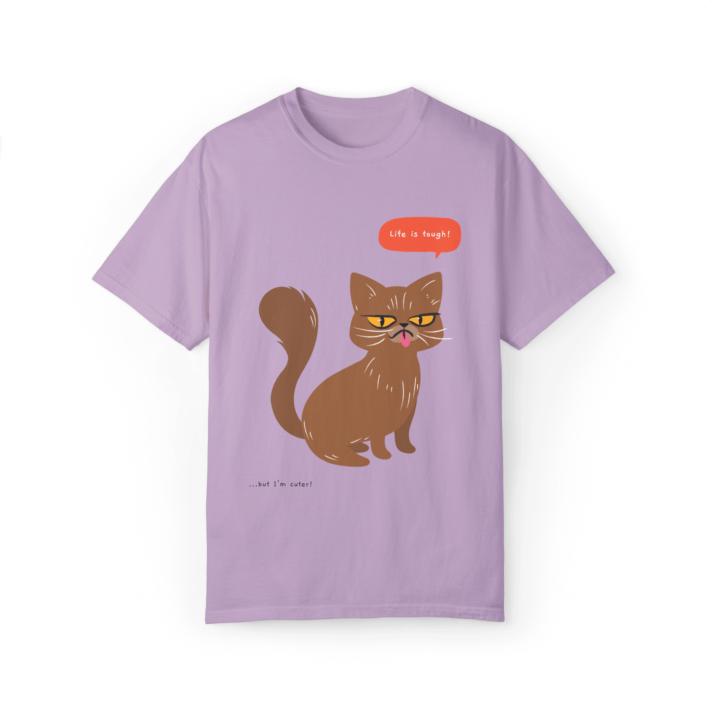 Purple T-shirt featuring a brown cat illustration with the phrase 'Life is tough!' and a humorous note '...but I'm cuter!