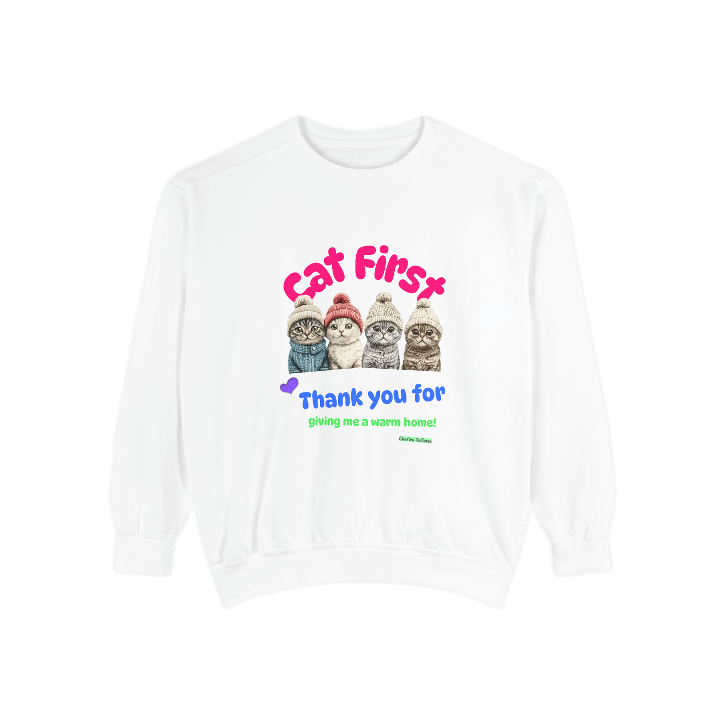 White sweatshirt with a colorful design featuring four Scottish Fold cats wearing knitted hats and the text 'Cat First' and 'Thank you for giving me a warm home!' displayed on a plain black background.