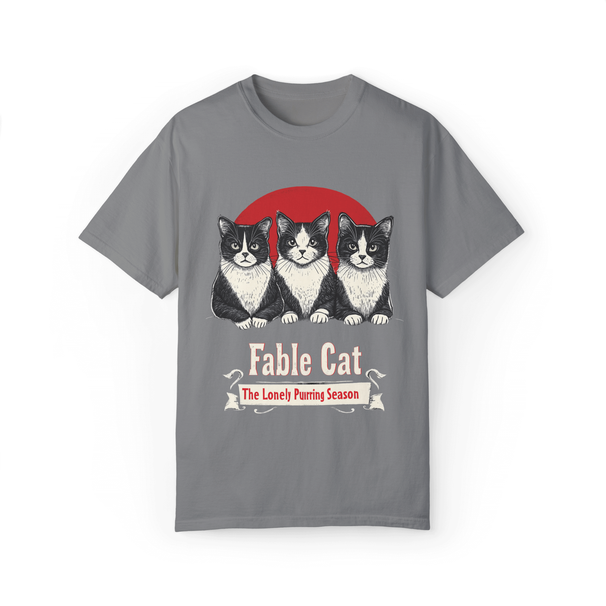 Gray T-shirt with a 'Fable Cat' design featuring three black-and-white cats sitting in front of a red circle, with the tagline 'The Lonely Purring Season.