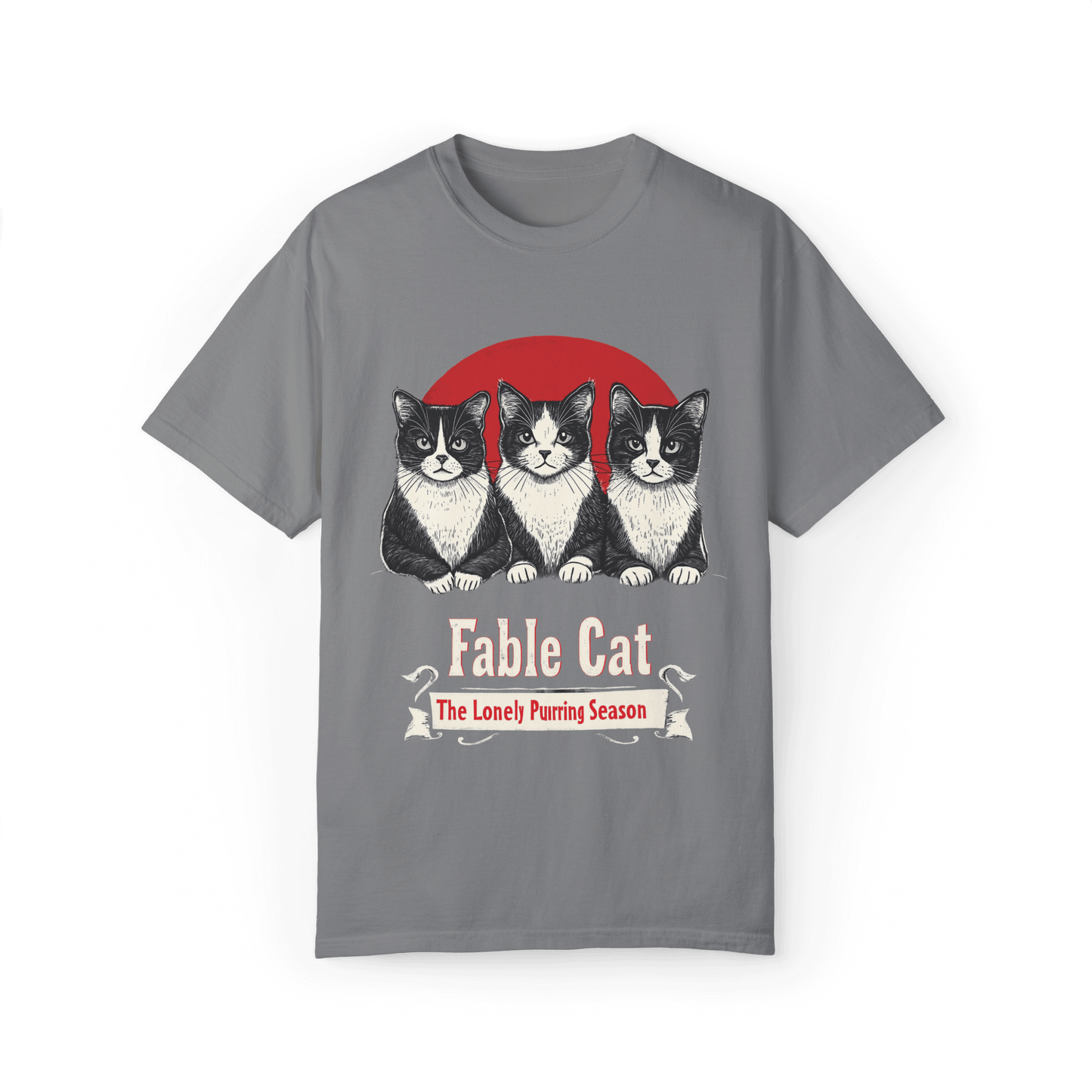 Gray T-shirt with a 'Fable Cat' design featuring three black-and-white cats sitting in front of a red circle, with the tagline 'The Lonely Purring Season.