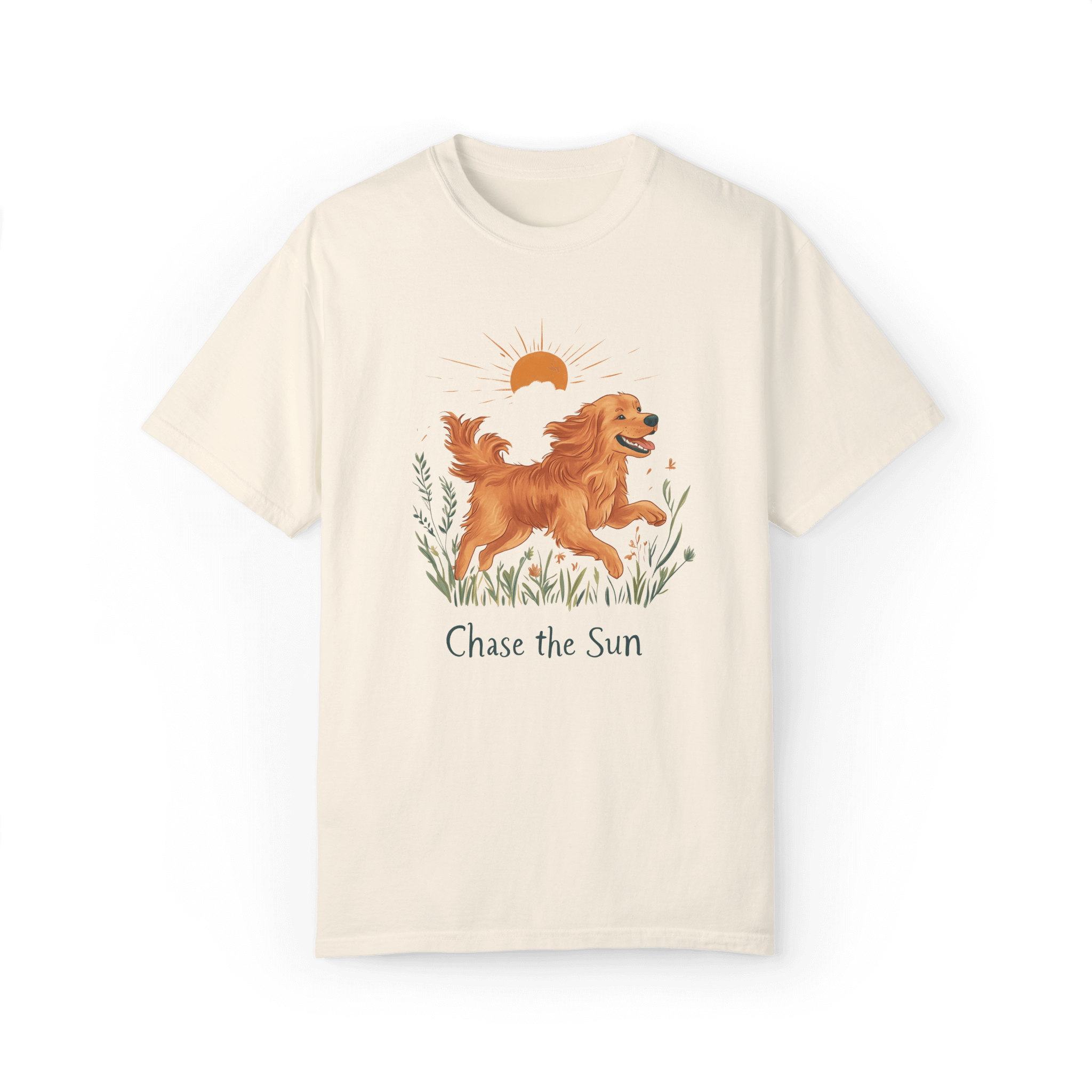 A off-white T-shirt featuring an illustration of a running golden retriever with a warm sun and natural wildflowers in the background, complemented by the text 