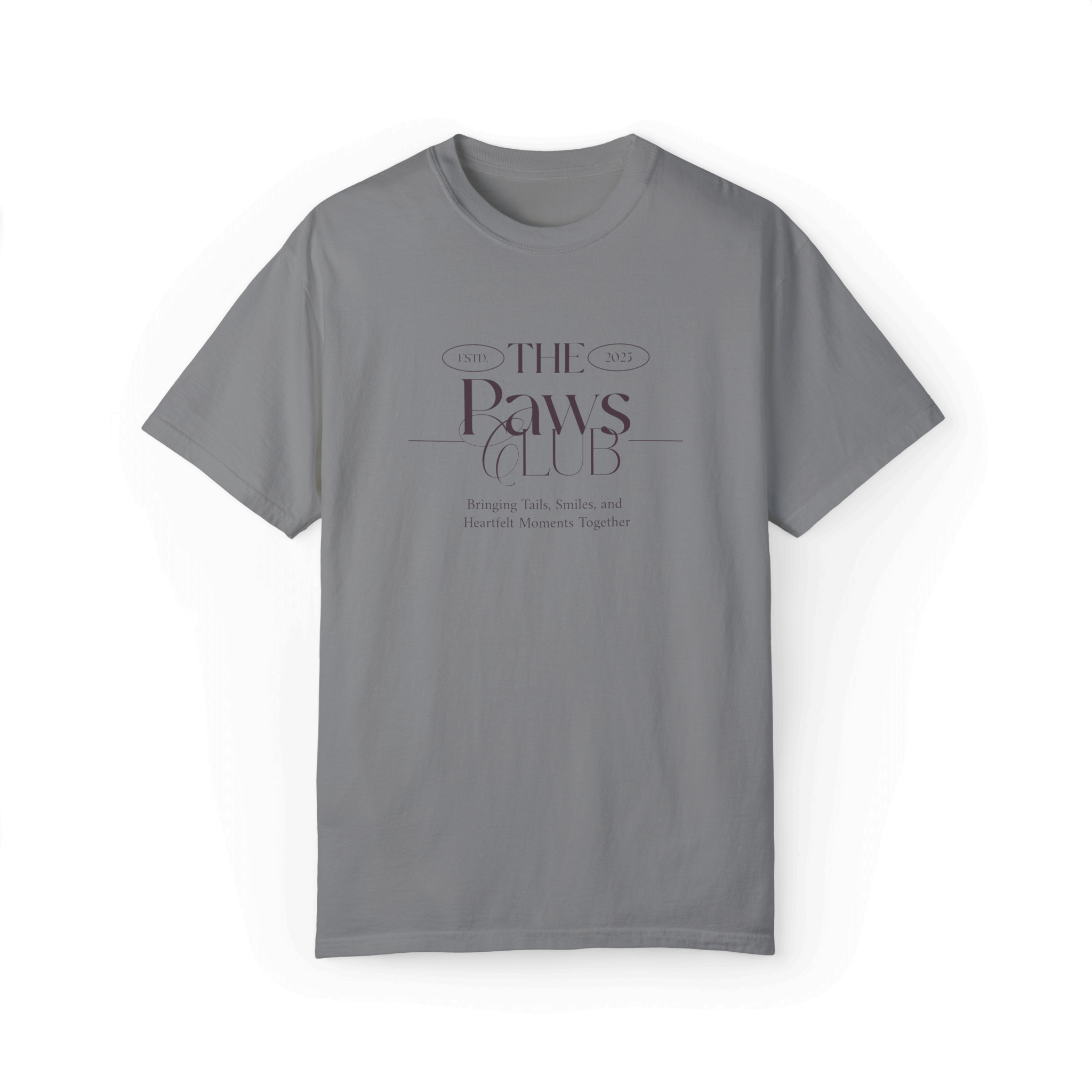 Gray T-shirt featuring 'The Paws Club' logo in elegant typography with the tagline 'Bringing Tails, Smiles, and Heartfelt Moments Together,' emphasizing a classic and minimalist style.