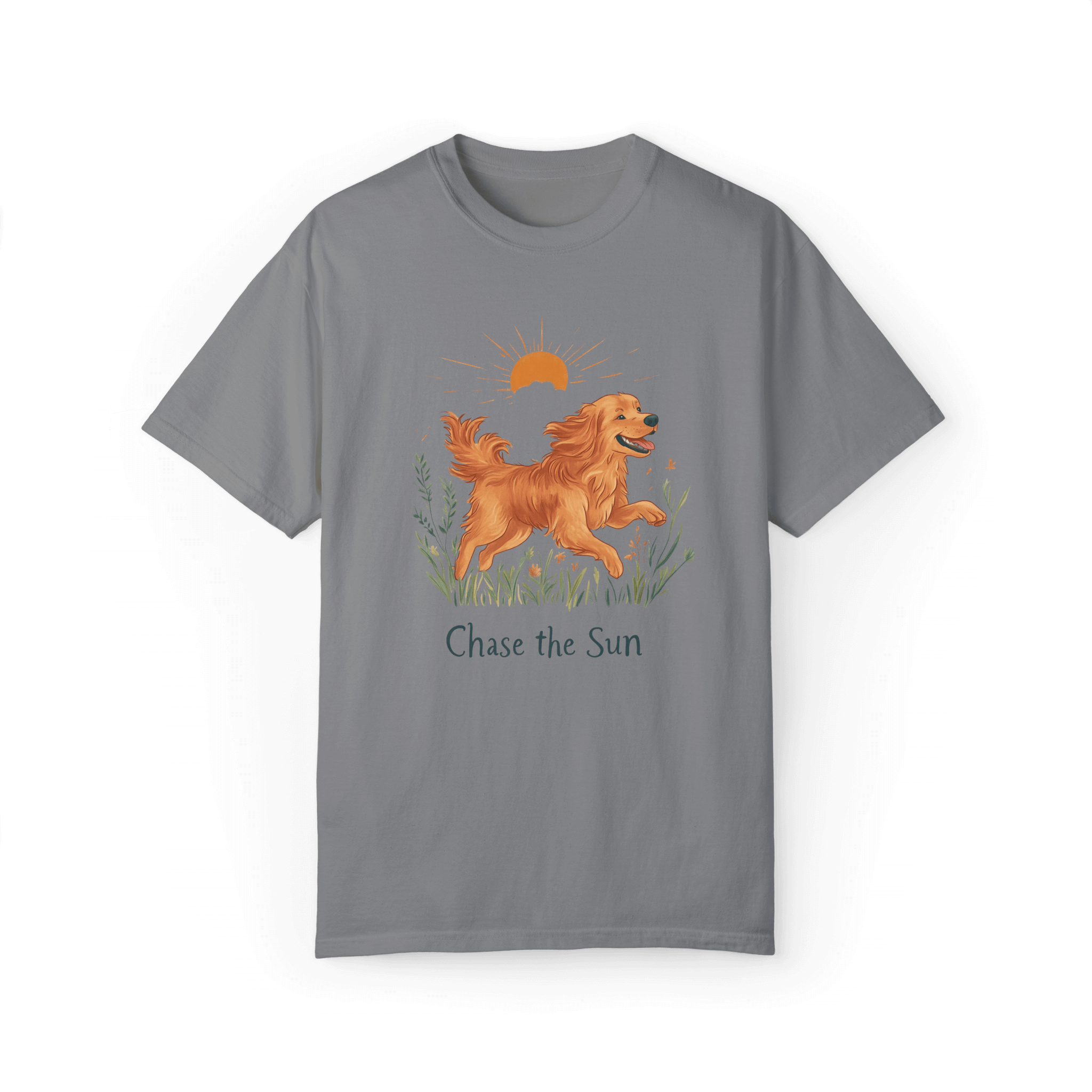 A gray T-shirt featuring an illustration of a running golden retriever with a warm sun and natural wildflowers in the background, complemented by the text 