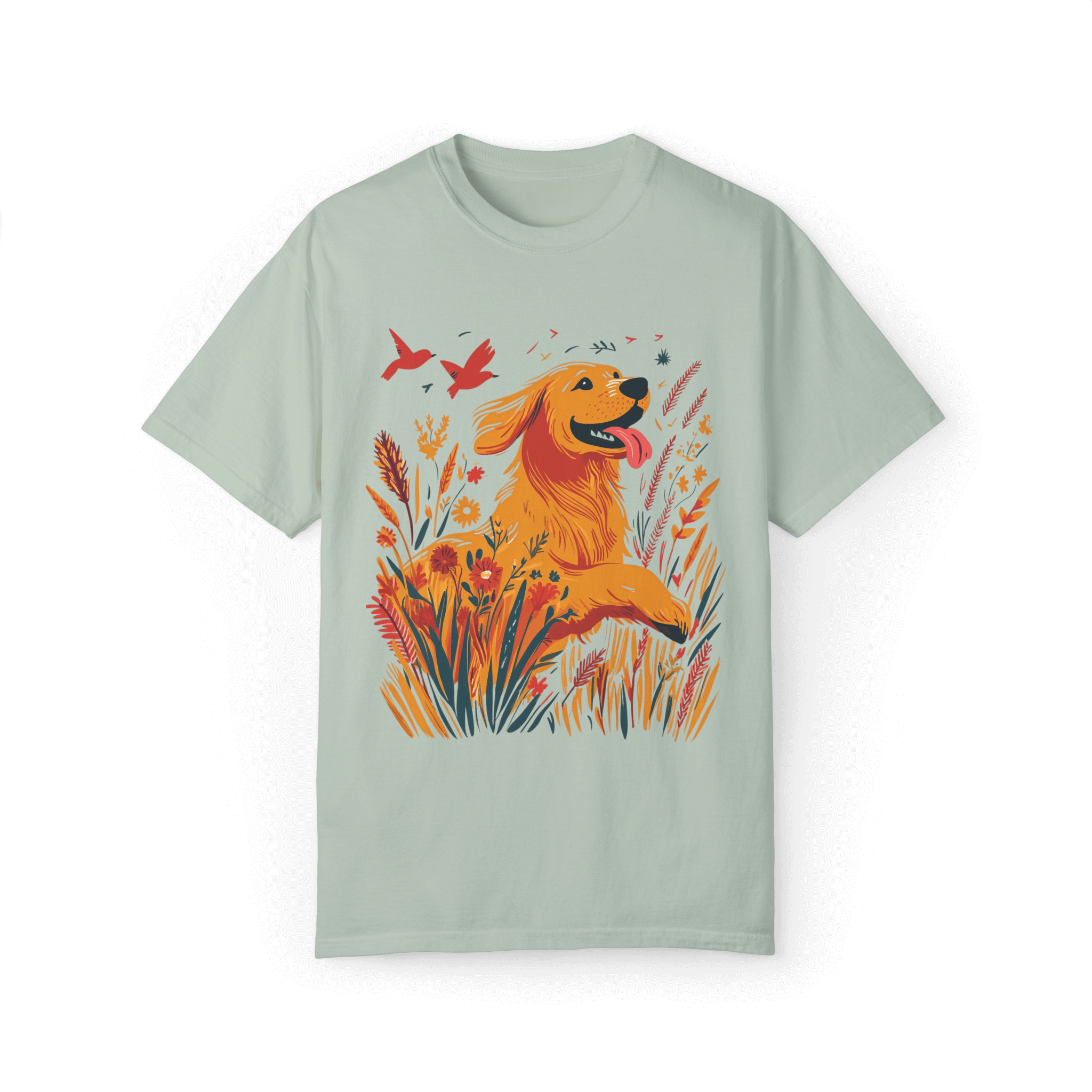 A light green T-shirt featuring a vibrant illustration of a golden retriever joyfully running through blooming wildflowers, with two red birds soaring in the sky, evoking a sense of nature and freedom.