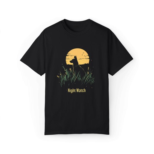 This black "Night Watch" T-shirt features a minimalist design showcasing a serene yet majestic dog silhouette under the moonlight, perfect for those who appreciate understated and unique styles.