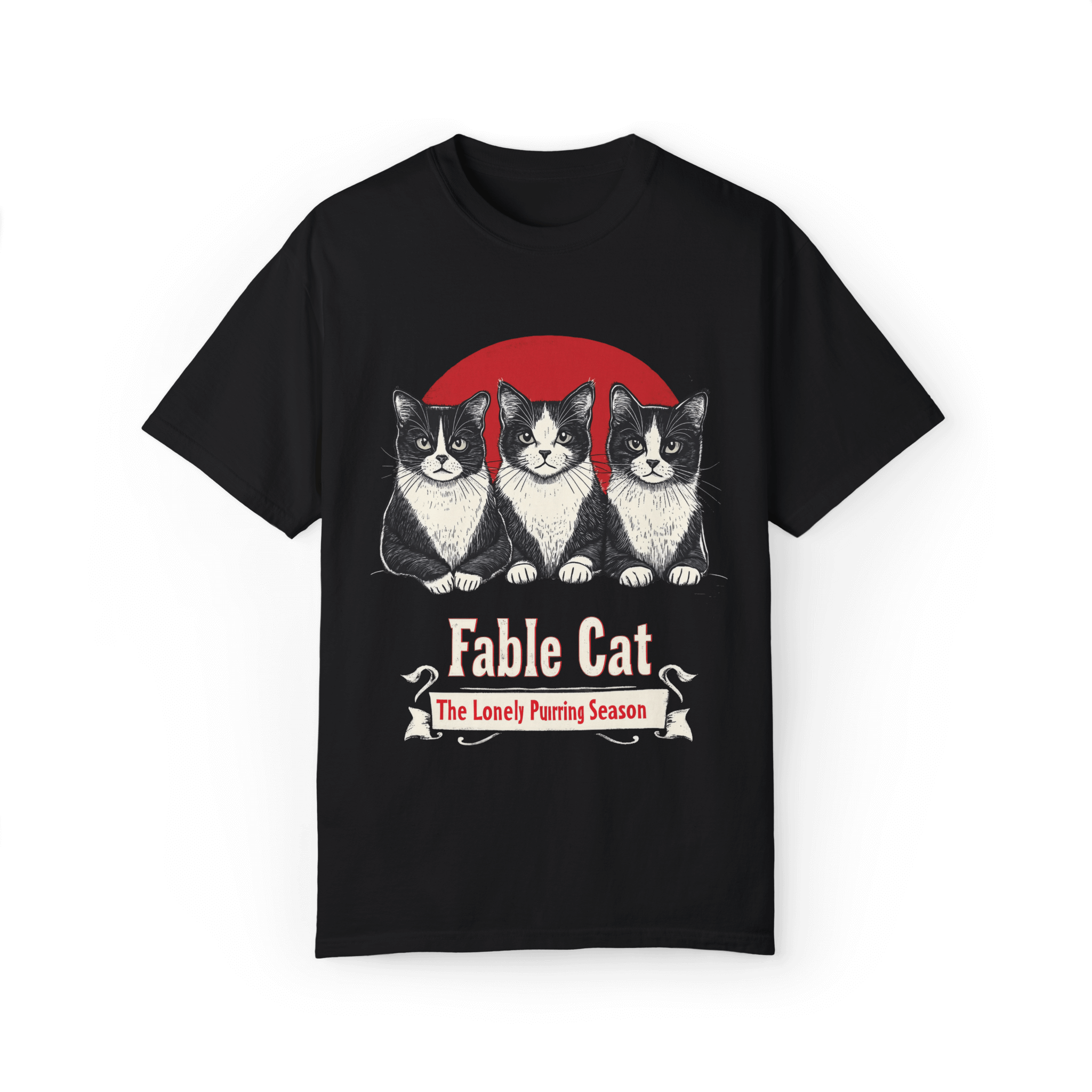 Black T-shirt featuring a 'Fable Cat' design with three black-and-white cats in front of a red circle, accompanied by the tagline 'The Lonely Purring Season.