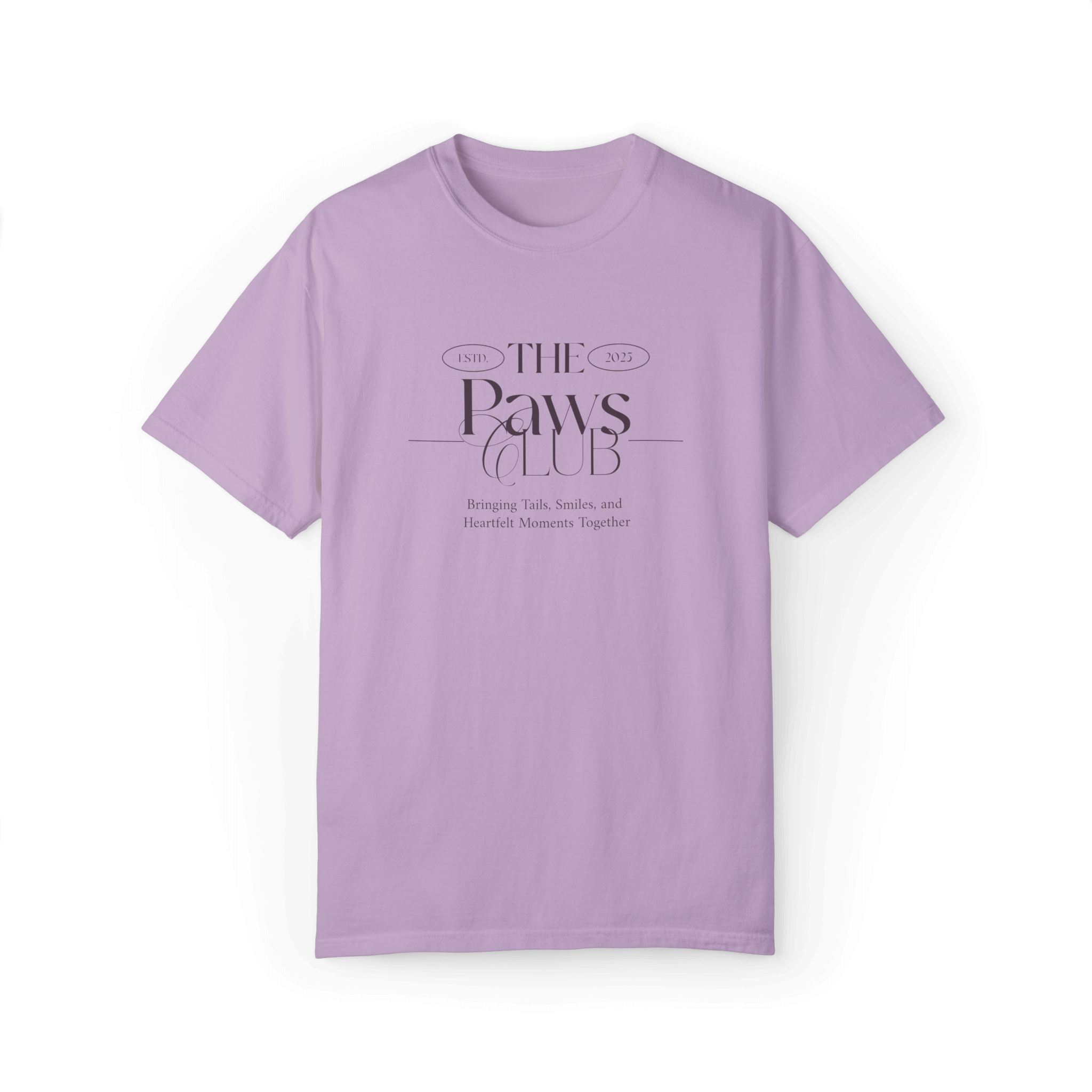 Light lavender T-shirt featuring 'The Paws Club' logo in elegant typography with the tagline 'Bringing Tails, Smiles, and Heartfelt Moments Together,' showcasing a minimalist and stylish design.