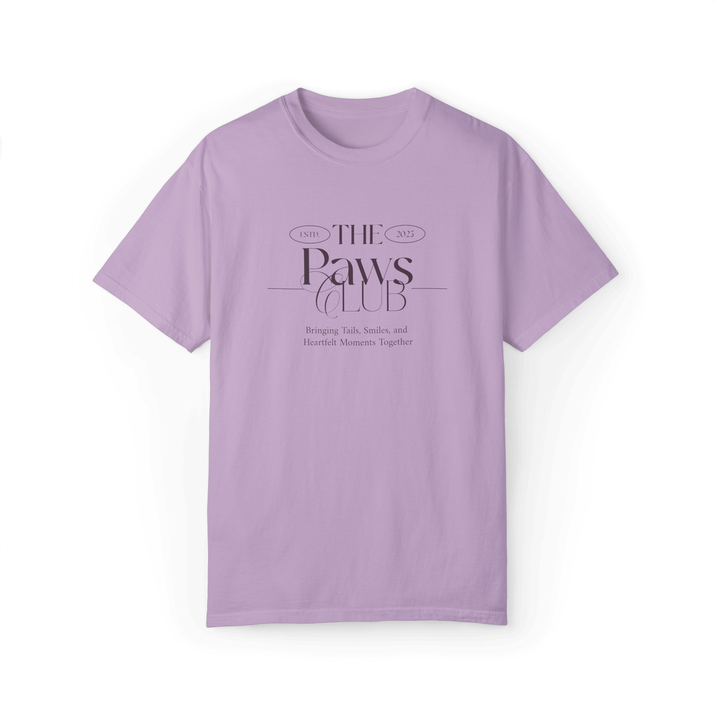 Light lavender T-shirt featuring 'The Paws Club' logo in elegant typography with the tagline 'Bringing Tails, Smiles, and Heartfelt Moments Together,' showcasing a minimalist and stylish design.