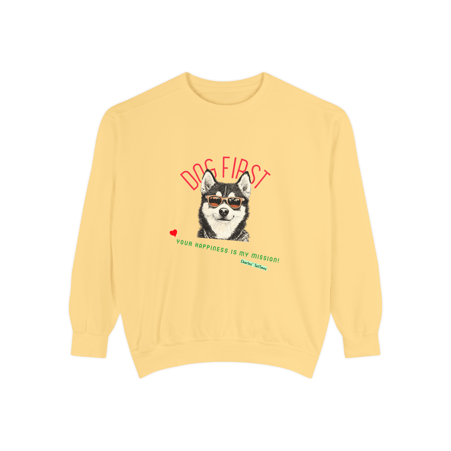 Light yellow crewneck sweatshirt featuring an illustration of a Husky wearing sunglasses, with the text "Dog First" in red above and "Your happiness is my mission!" in green below, along with the brand name Charles' TailTimes, displayed on a solid black b