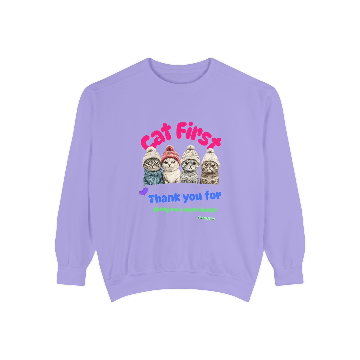 Light purple sweatshirt featuring a colorful design of four Scottish Fold cats wearing knitted hats, with the text 'Cat First' in pink and 'Thank you for giving me a warm home!' in blue and green, by Charles TailTimes.