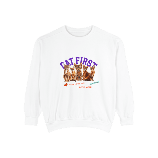 White sweatshirt featuring a graphic of four Abyssinian cats wearing colorful knitted hats with the text 'Cat First' in pink and 'Thank you for giving me a warm home!' in blue and green, created by Charles TailTimes.