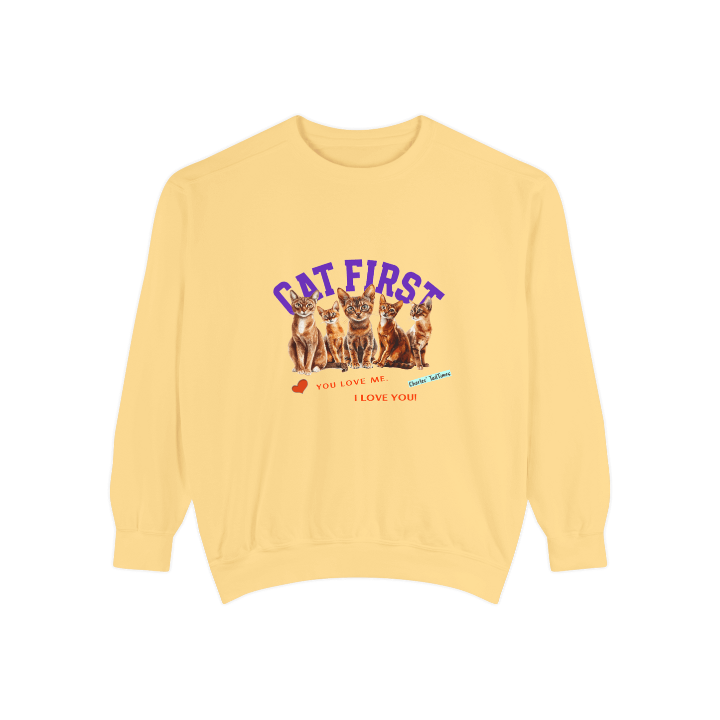 Yellow sweatshirt featuring Abyssinian cat illustrations, with the text "Cat First" in purple and the red phrases "You love me. I love you!" accompanied by a heart icon and Charles TailTimes branding.